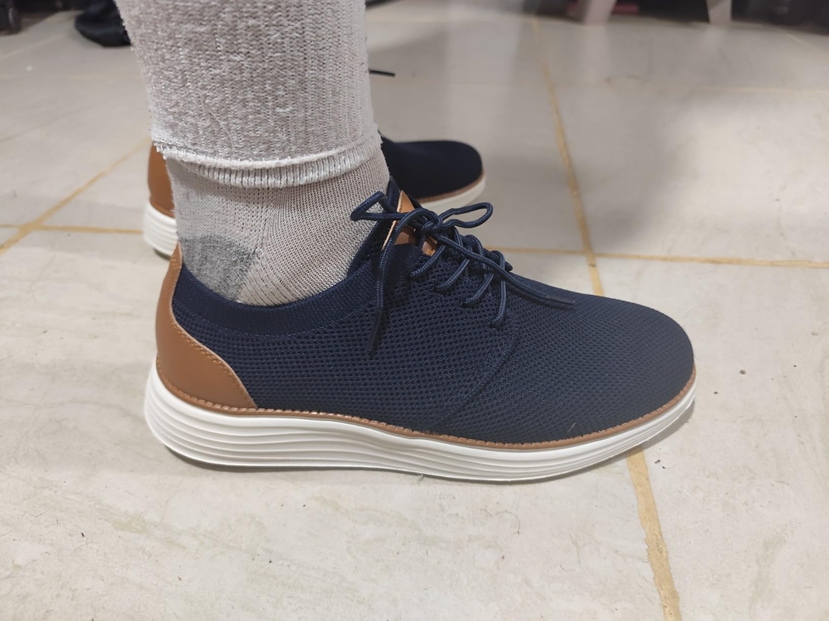 VILOCY dress sneakers styled with casual business attire showing versatility