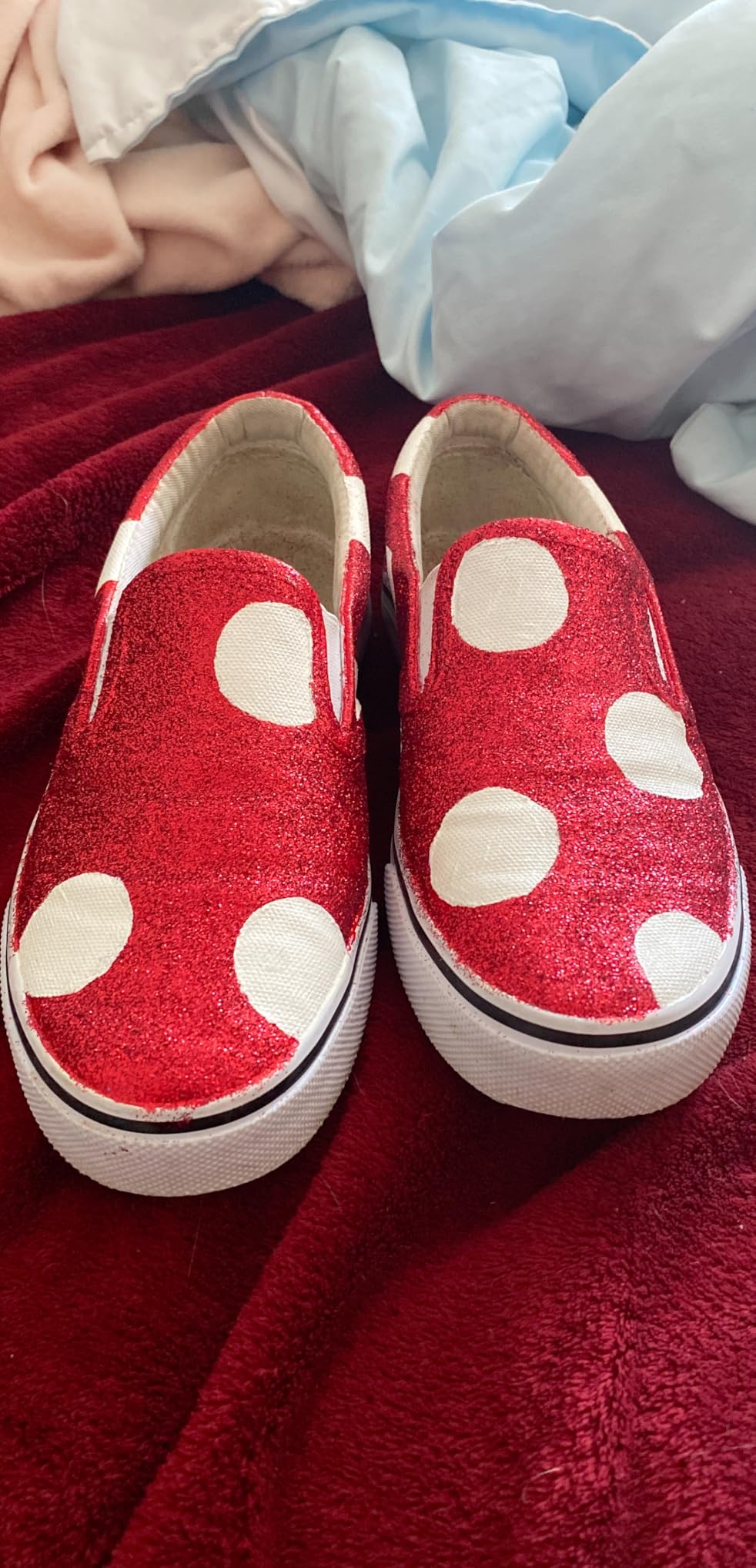 Lugz Clipper canvas sneakers showing side gore panels and slip-on design details
