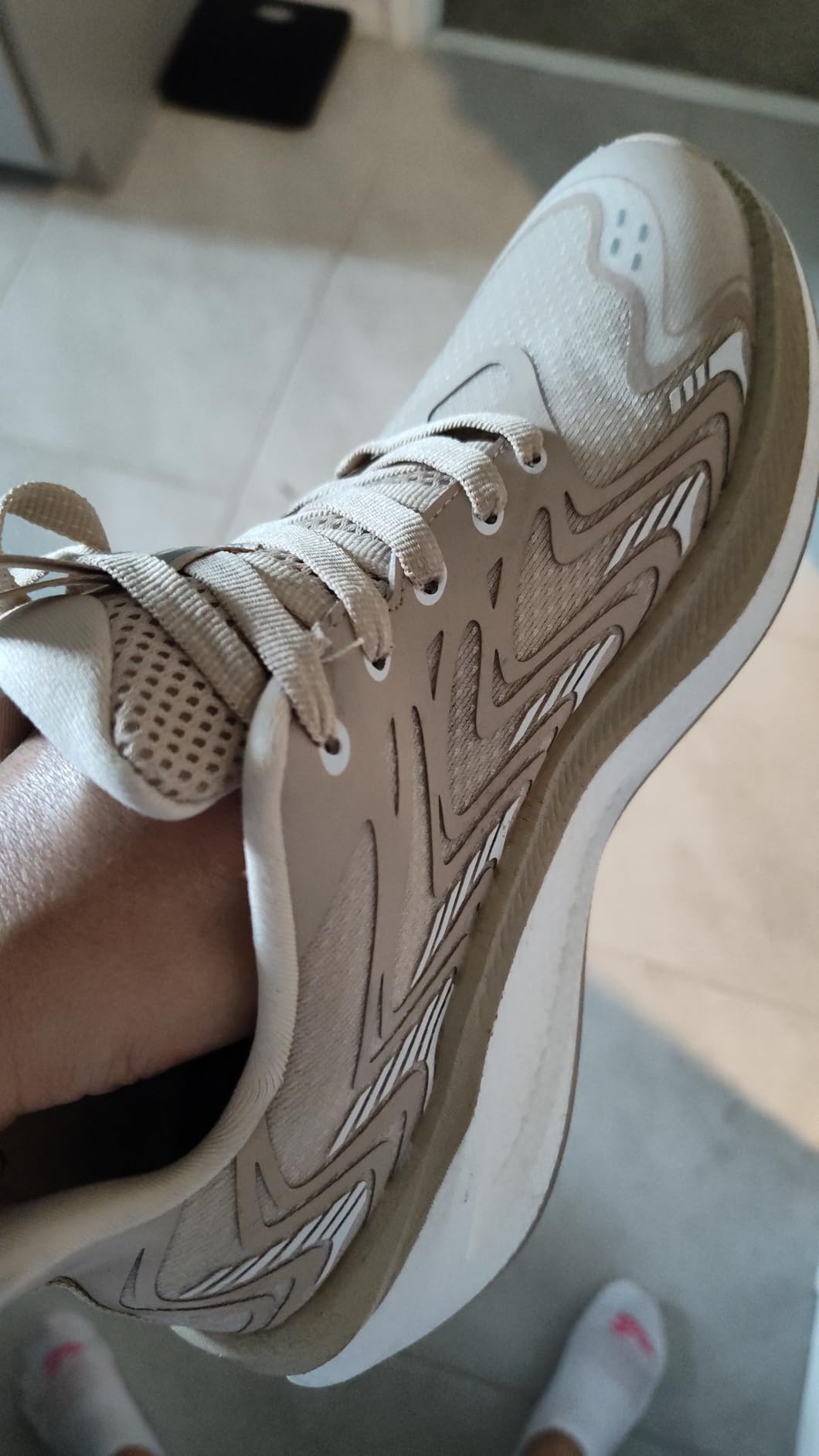 Side profile of ALLSWIFIT shoes showing heel design and overall silhouette for style assessment