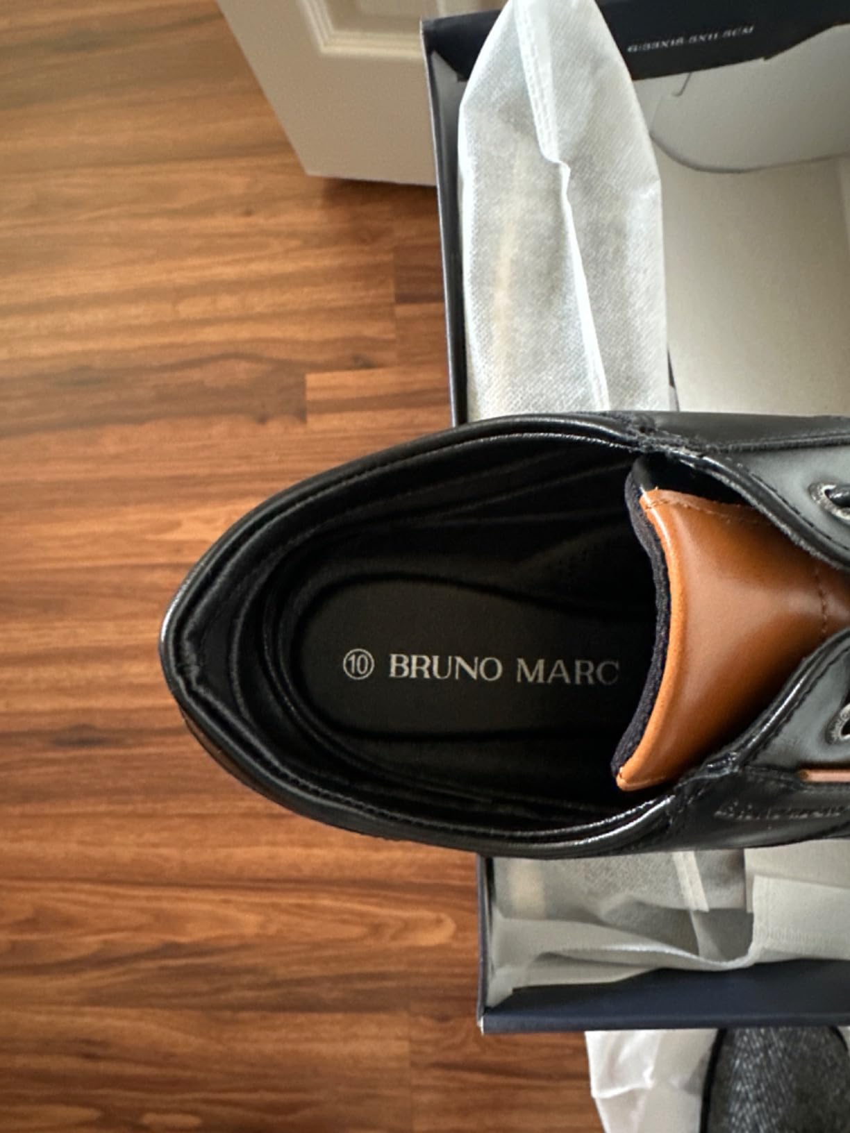 Top-down view of Bruno Marc dress shoes showing the lace pattern and overall construction quality