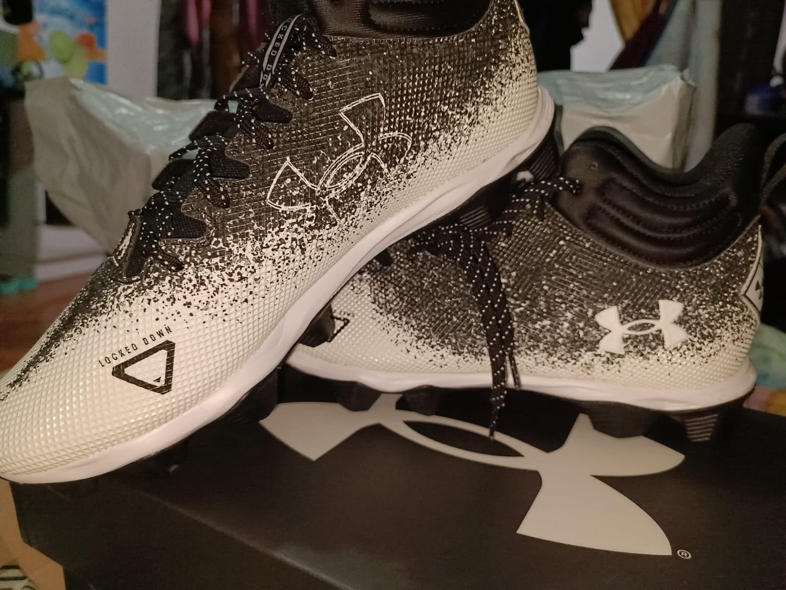 Close up view of Under Armour Spotlight Fran 2.0 showing synthetic upper construction and ankle collar detail