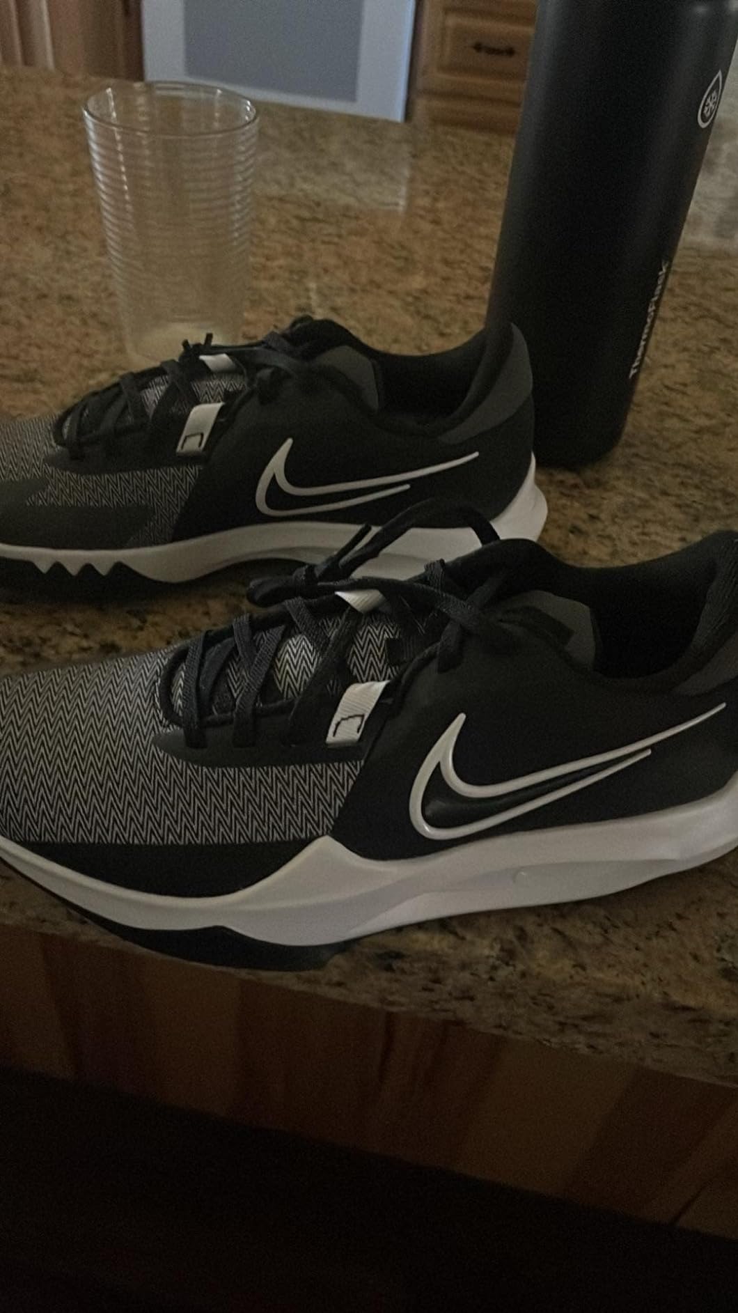 Nike Downshifter 12 during various weather conditions showing outdoor performance and durability