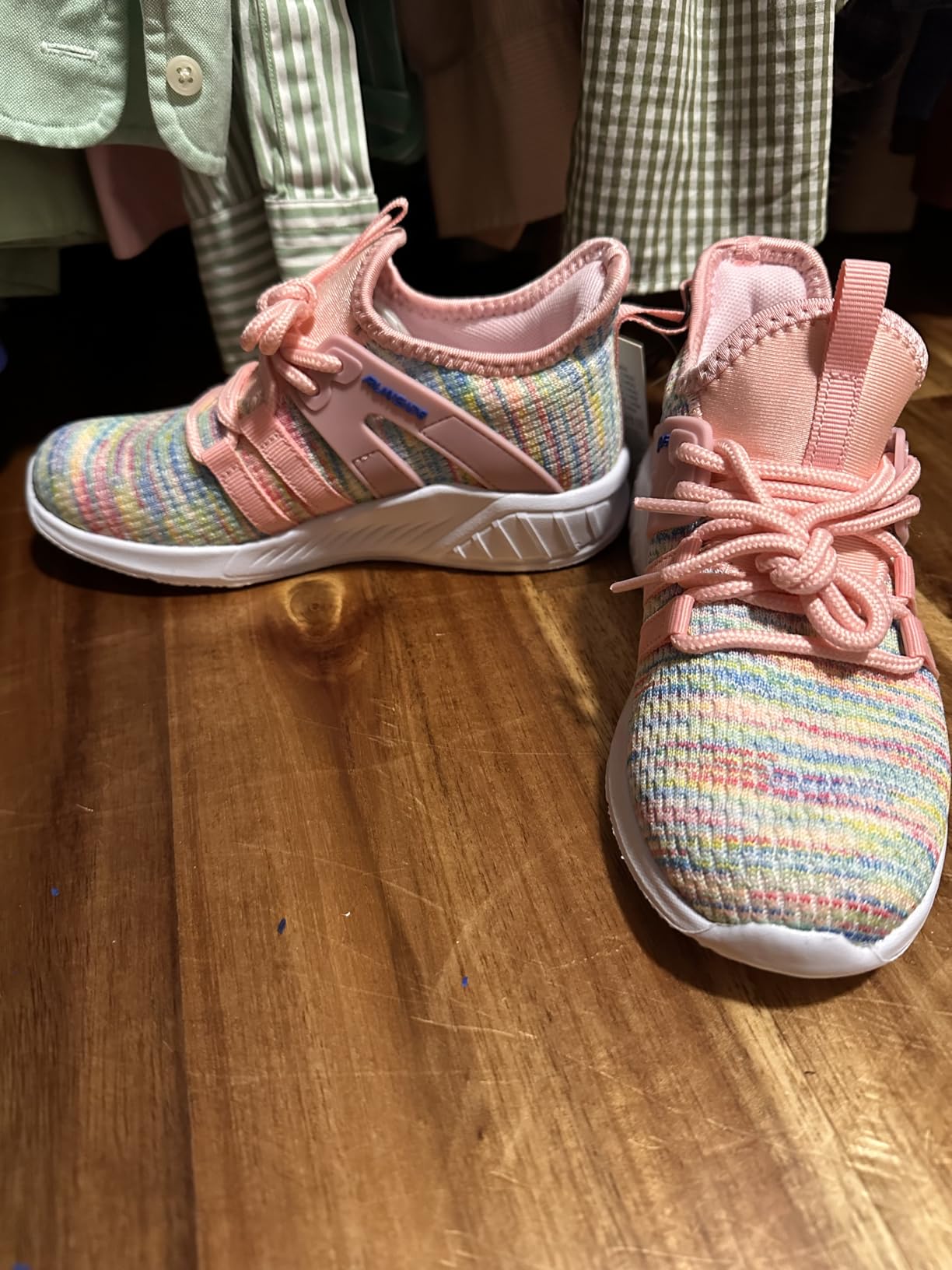 Close-up of RUNSIDE sneakers showing breathable knitted upper and gradient color pattern