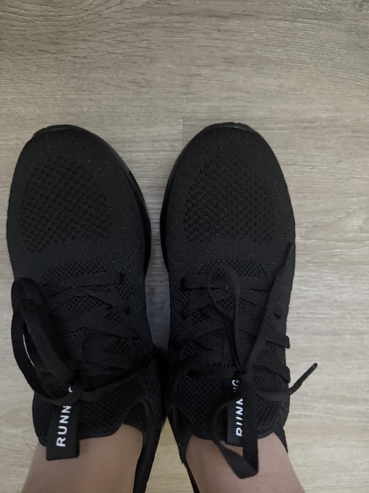 Side view of AUPERF women's athletic shoes showing cushioning and sole design