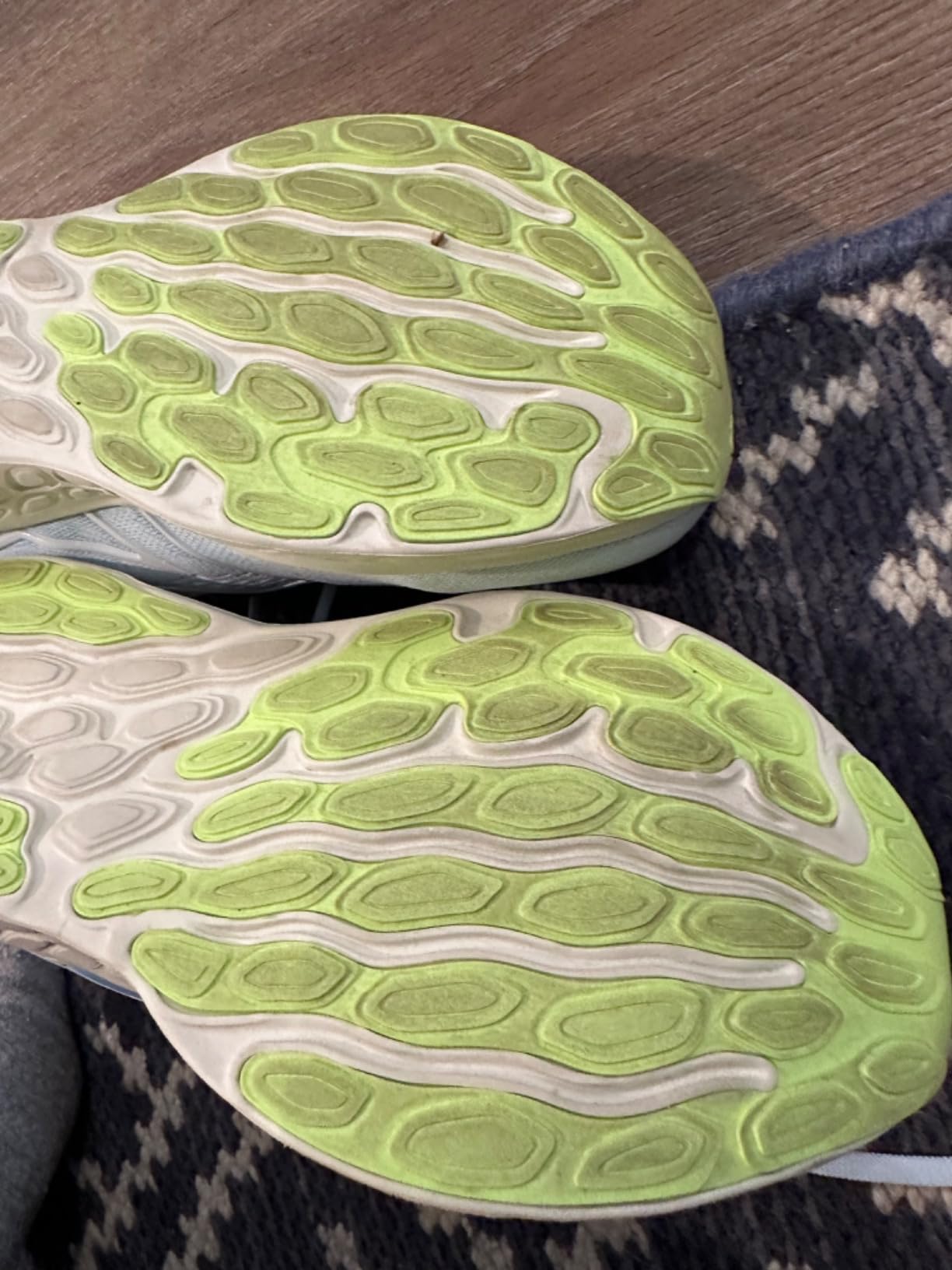 Close-up detail of New Balance Fresh Foam 680 V8 showing upper mesh construction and lacing