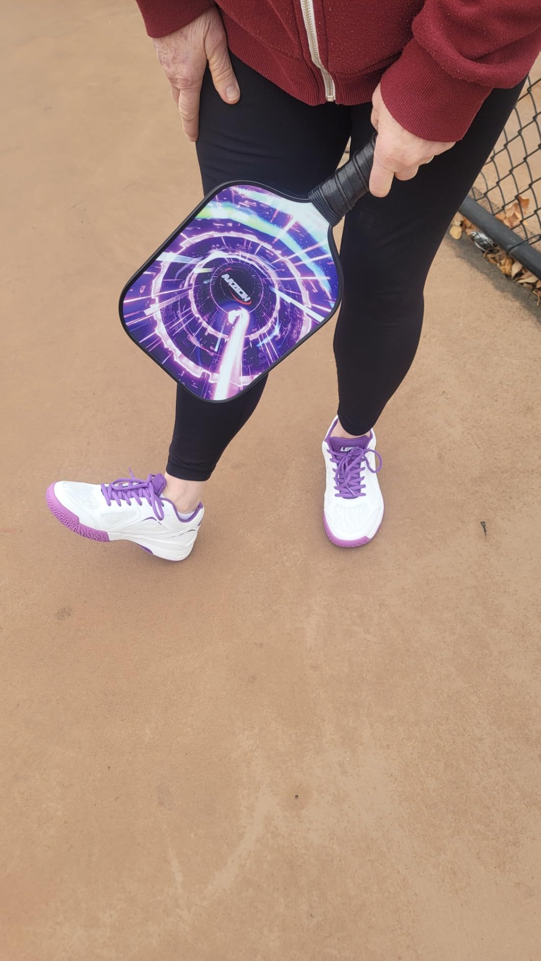 LEFUS P601 action shot showing court performance and purple color highlights