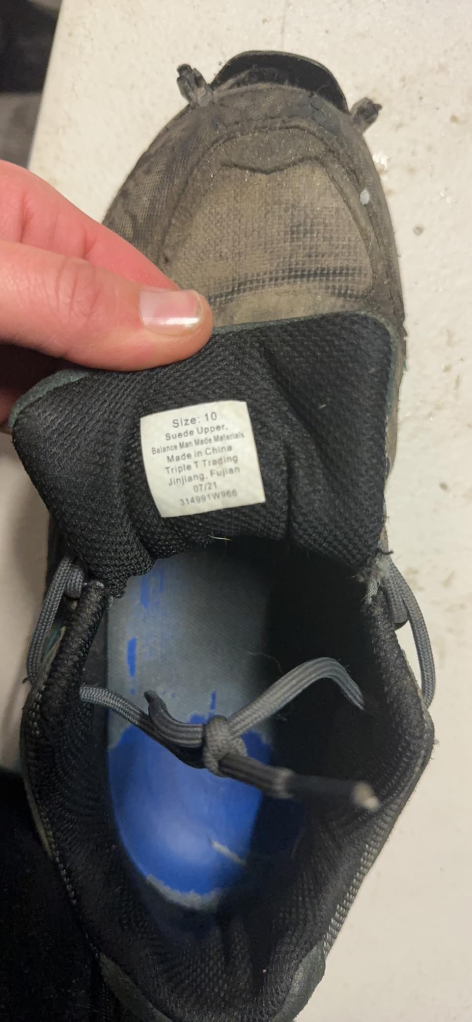 Side profile of worn Northside Monroe hiking shoe showing wear patterns after several weeks of testing