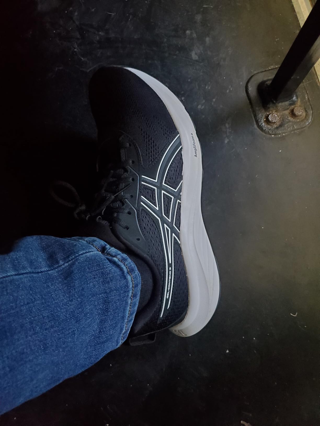 ASICS Gel-Contend 9 side profile showing jacquard mesh upper construction and rubber outsole