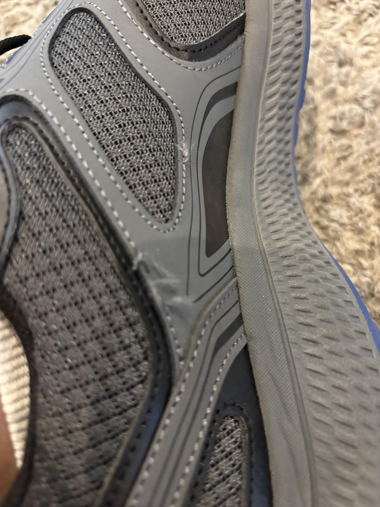 Close-up of Skechers GoRun Consistent showing stitching issues and wear patterns