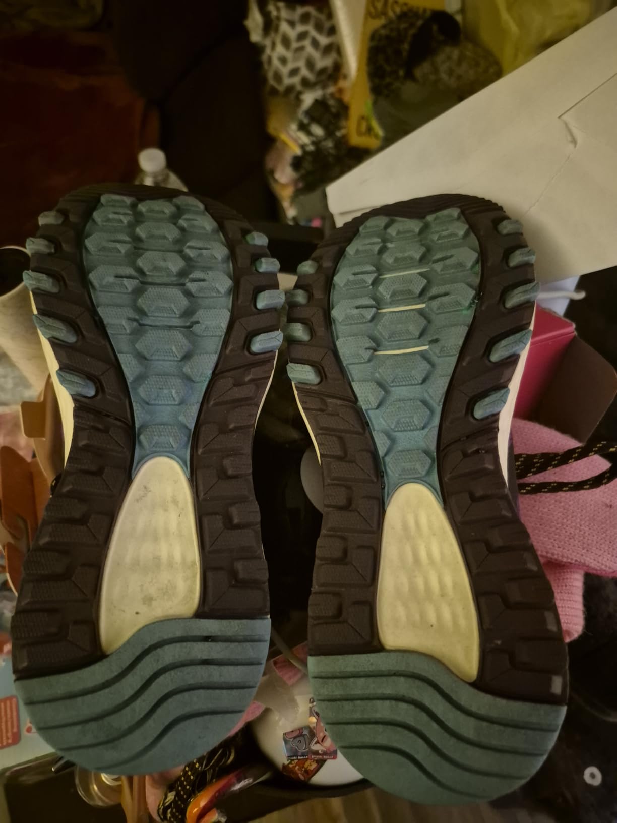Close-up detail of New Balance 410 V8 showing synthetic upper construction and overlay design