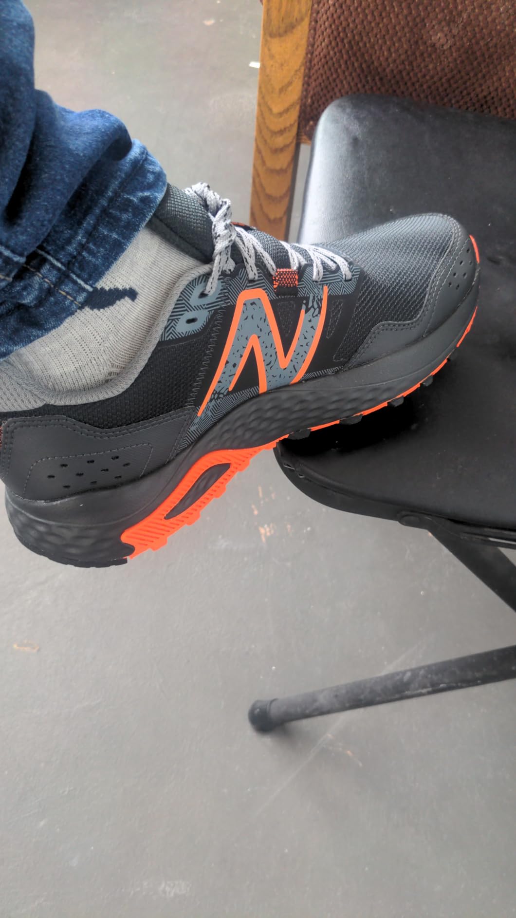New Balance MT410V8 in action on trail terrain showing real-world usage and tread performance