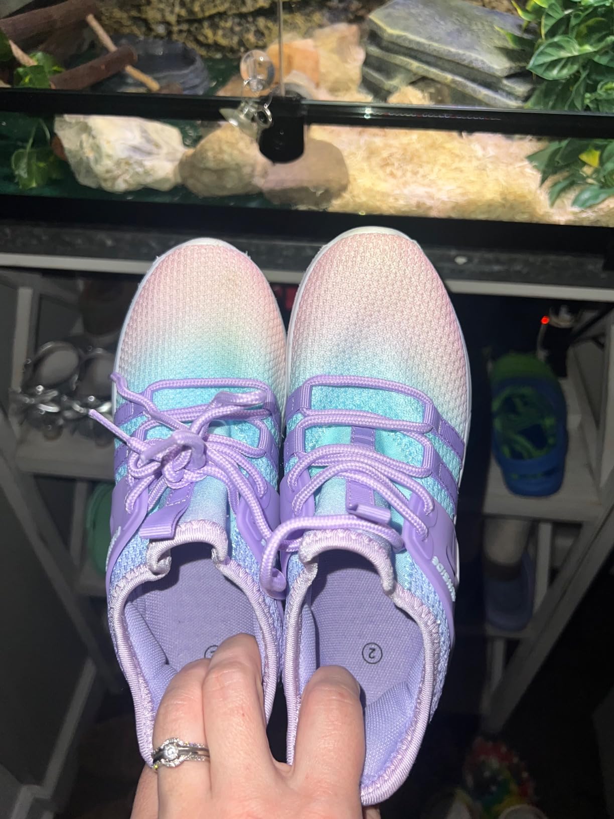 Bottom view of RUNSIDE sneakers showing EVA outsole tread pattern for traction