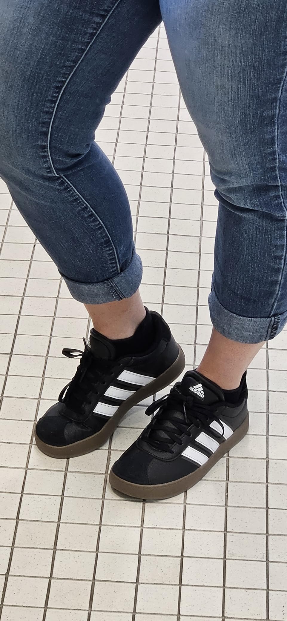 Kids wearing Adidas VL Court 3.0 shoes during active play showing real-world performance