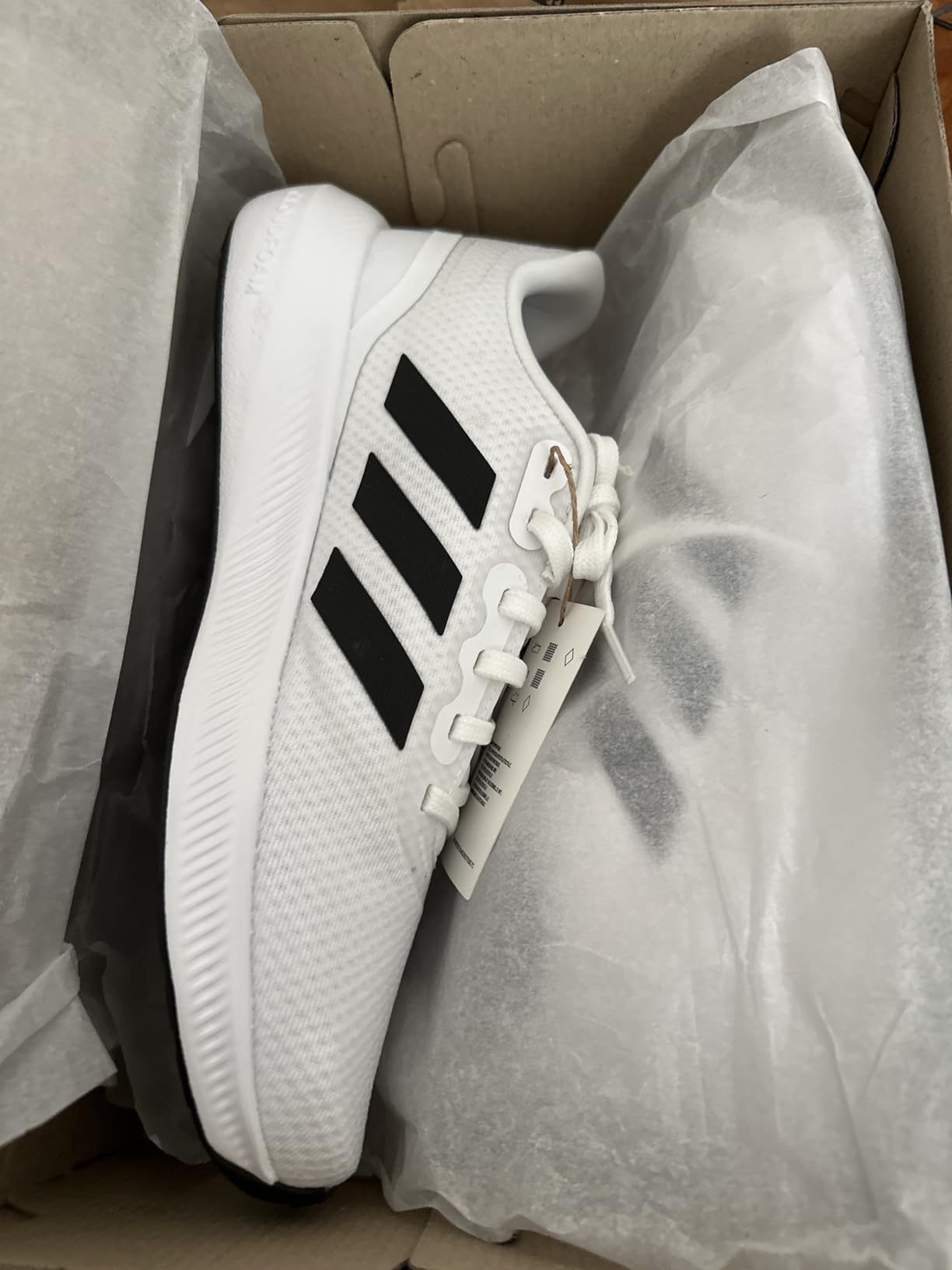 Side profile of Adidas Run Falcon 3.0 highlighting the Cloudfoam midsole technology and rubber outsole pattern