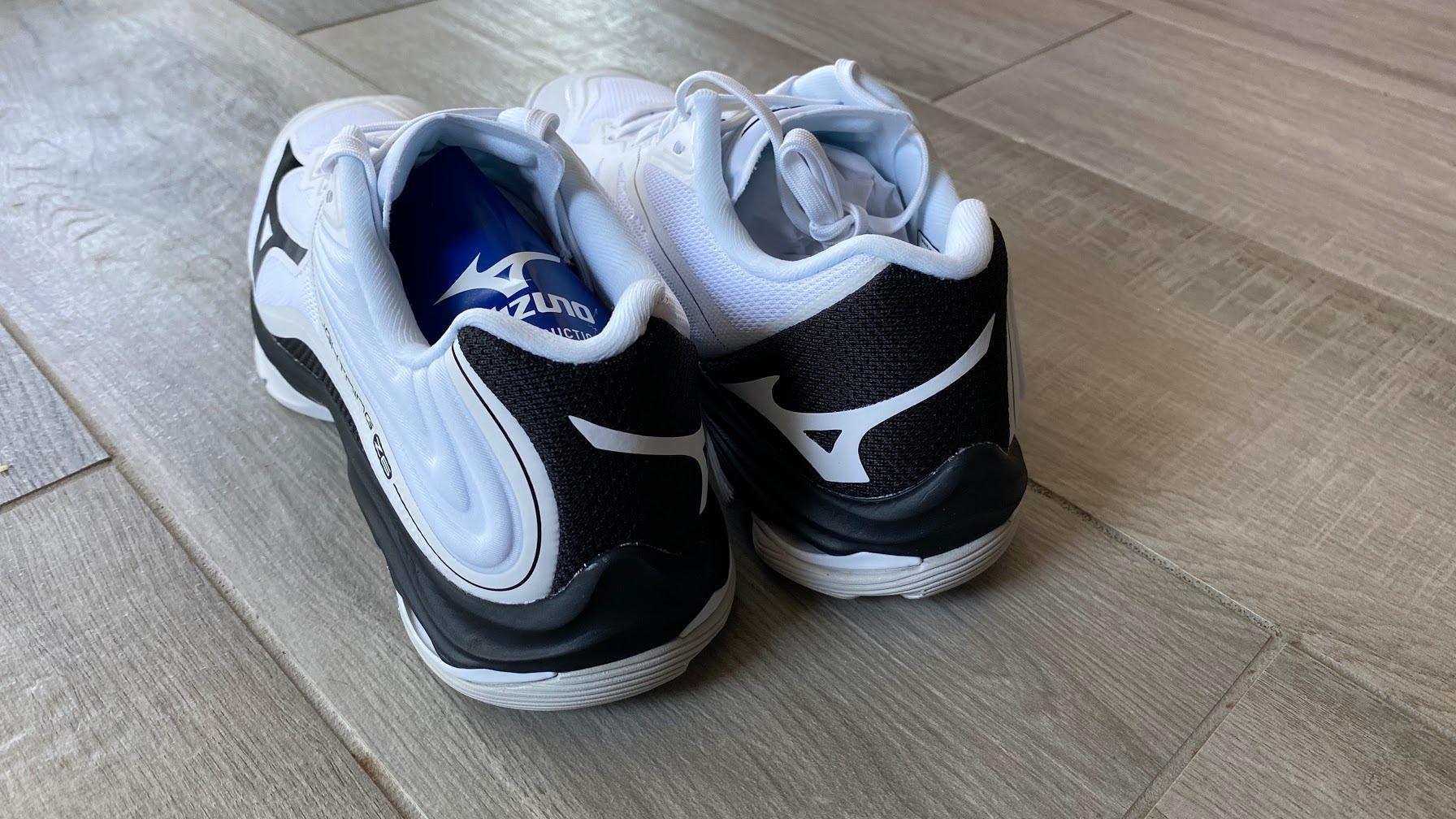 Mizuno volleyball shoe side profile showing court grip sole pattern and supportive midsole design