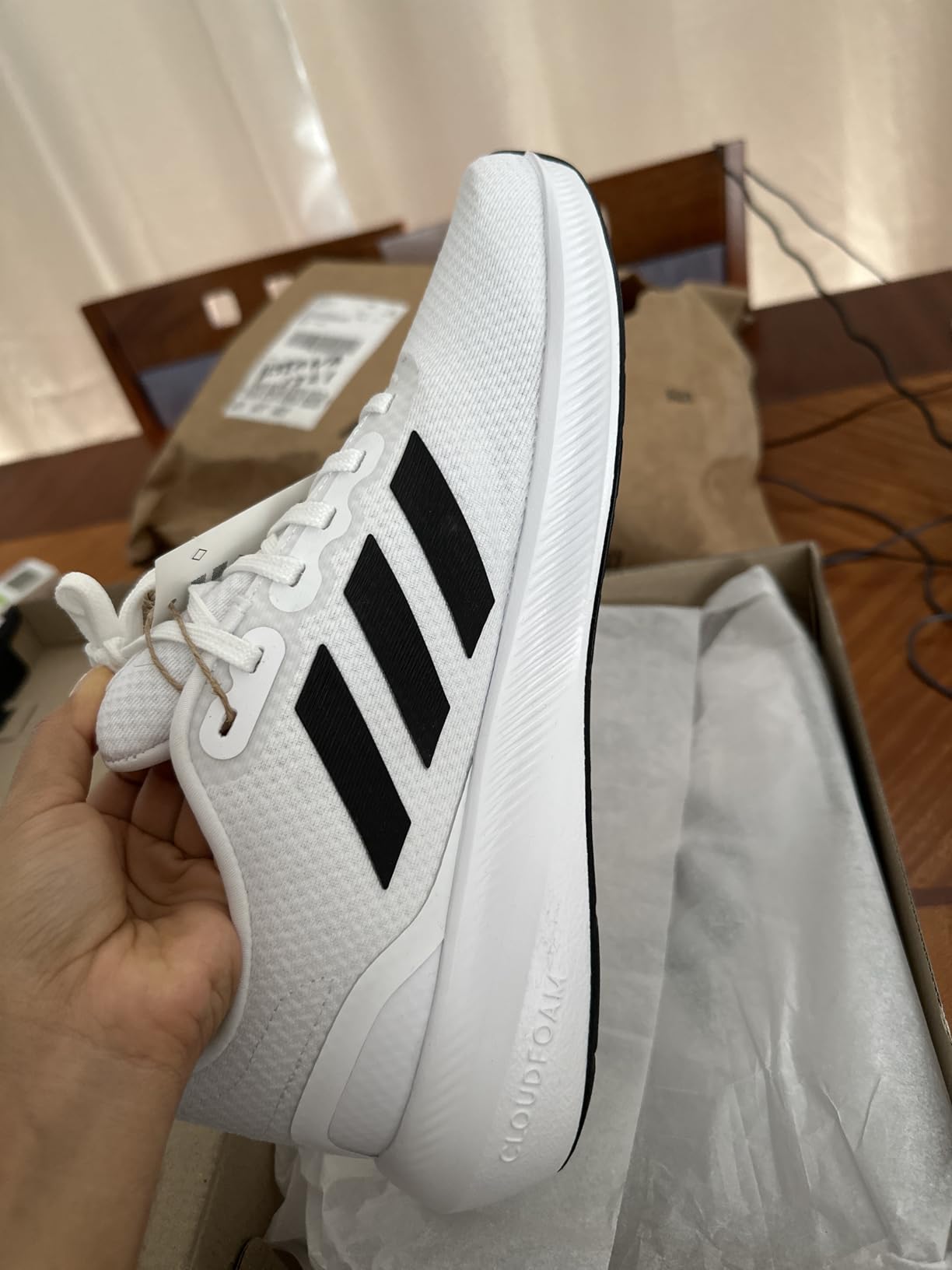 Bottom view of Adidas Run Falcon 3.0 showing detailed rubber outsole tread pattern for traction