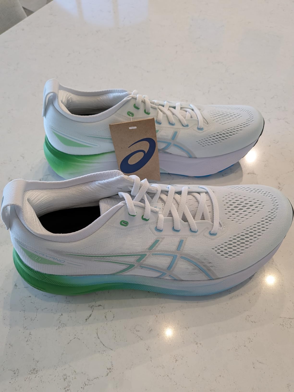 ASICS Gel-Kayano 31 in action showing heel strike and midsole compression during running