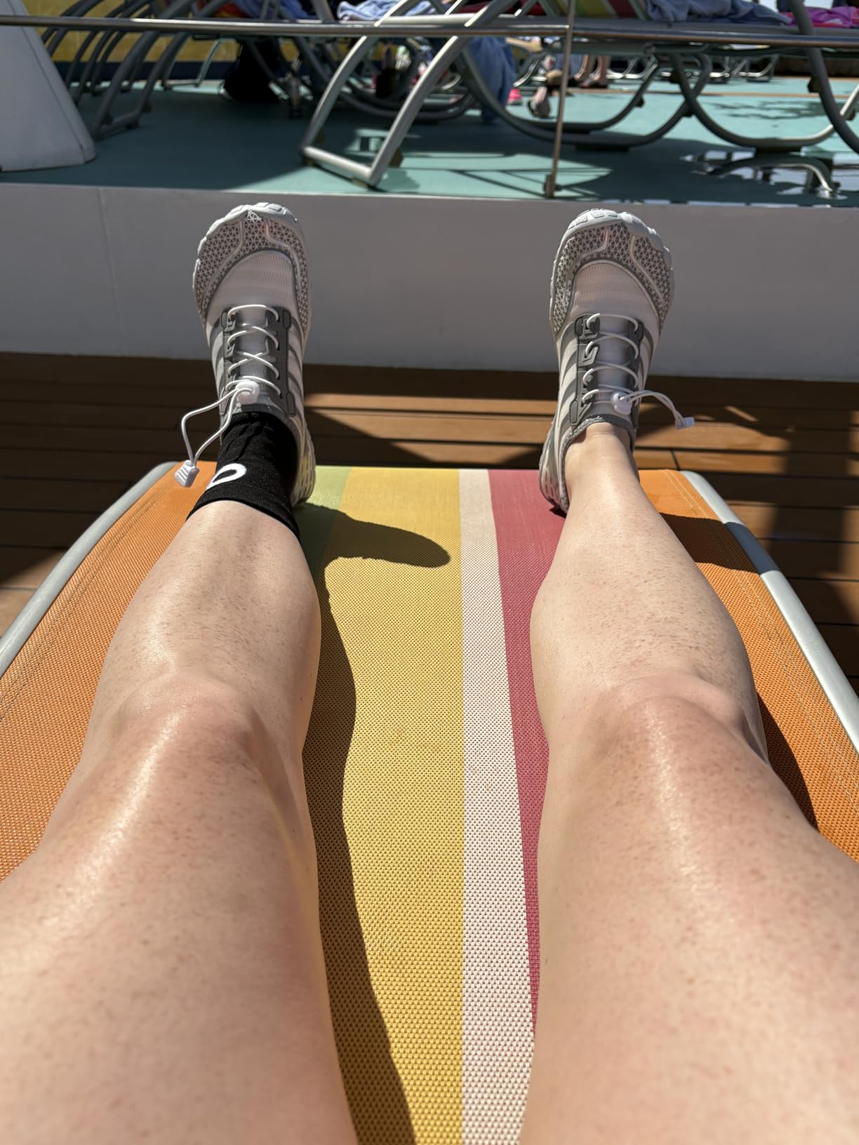 Customer wearing water shoes during cruise vacation showing real-world use