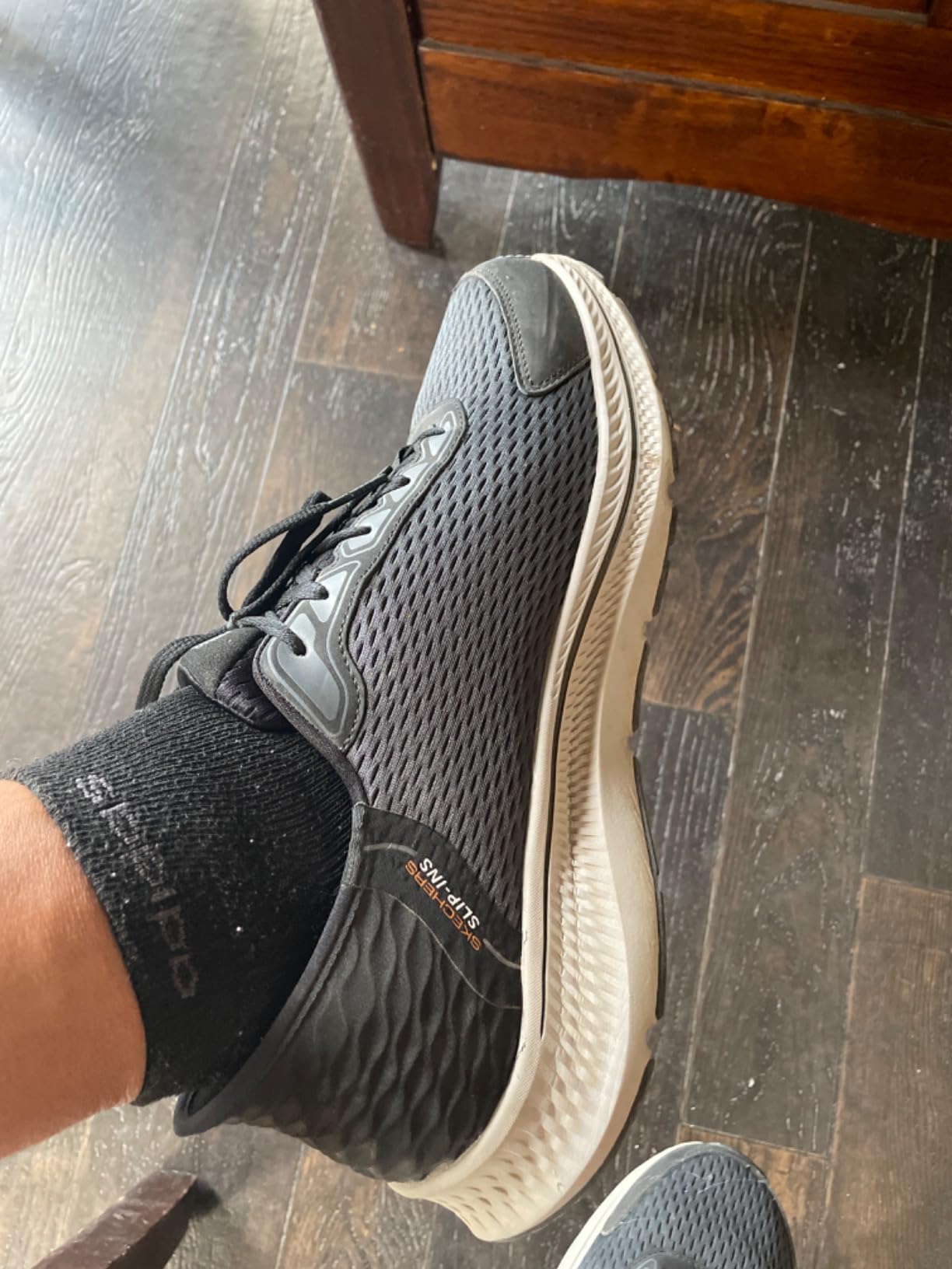 Skechers Go Run Consistent lifestyle shot showing versatility for different daily activities