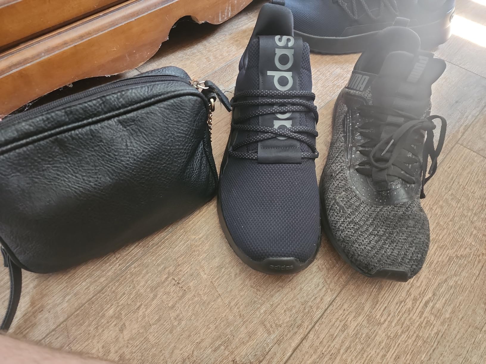 Close-up of Adidas Lite Racer slip-on construction showing textile upper and lacing system