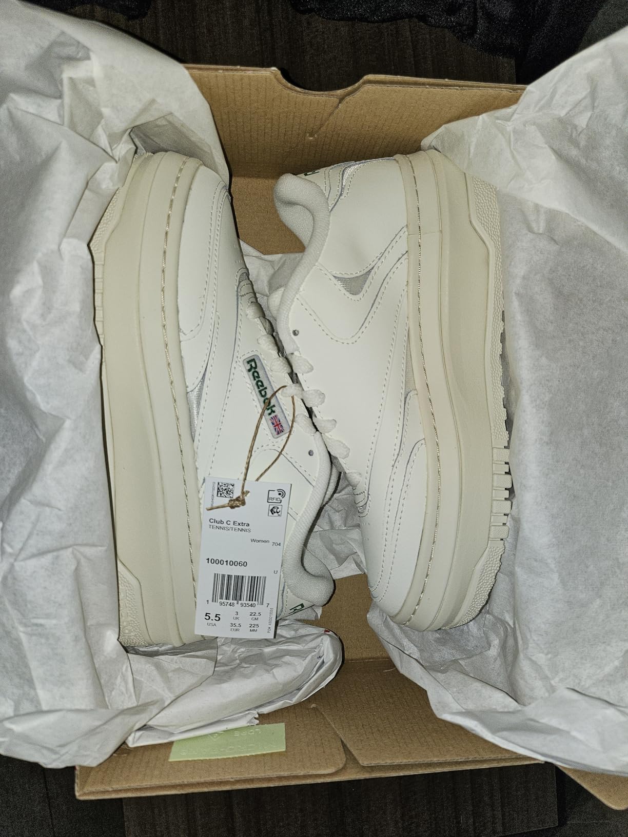 On-foot view of Reebok Club C Extra platform sneakers showing how they look when worn