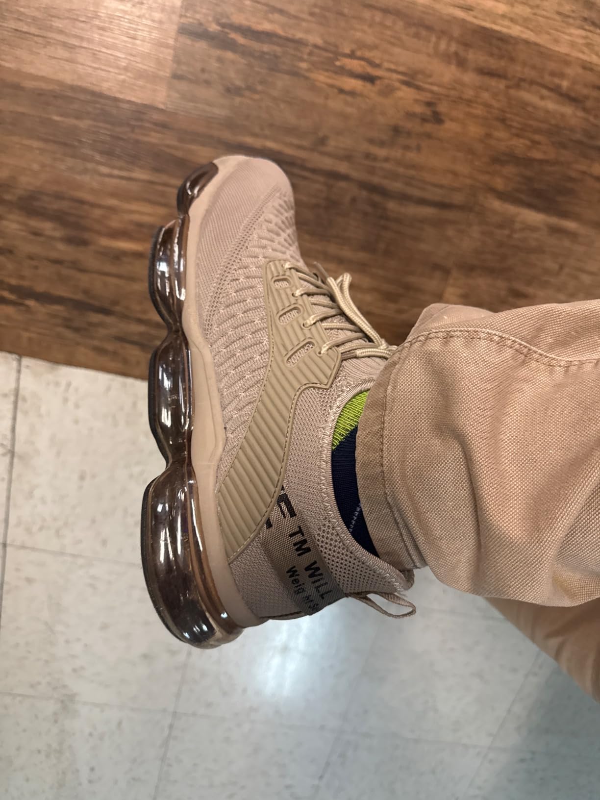 Close-up view of mesh fabric upper material and air cushion sole technology