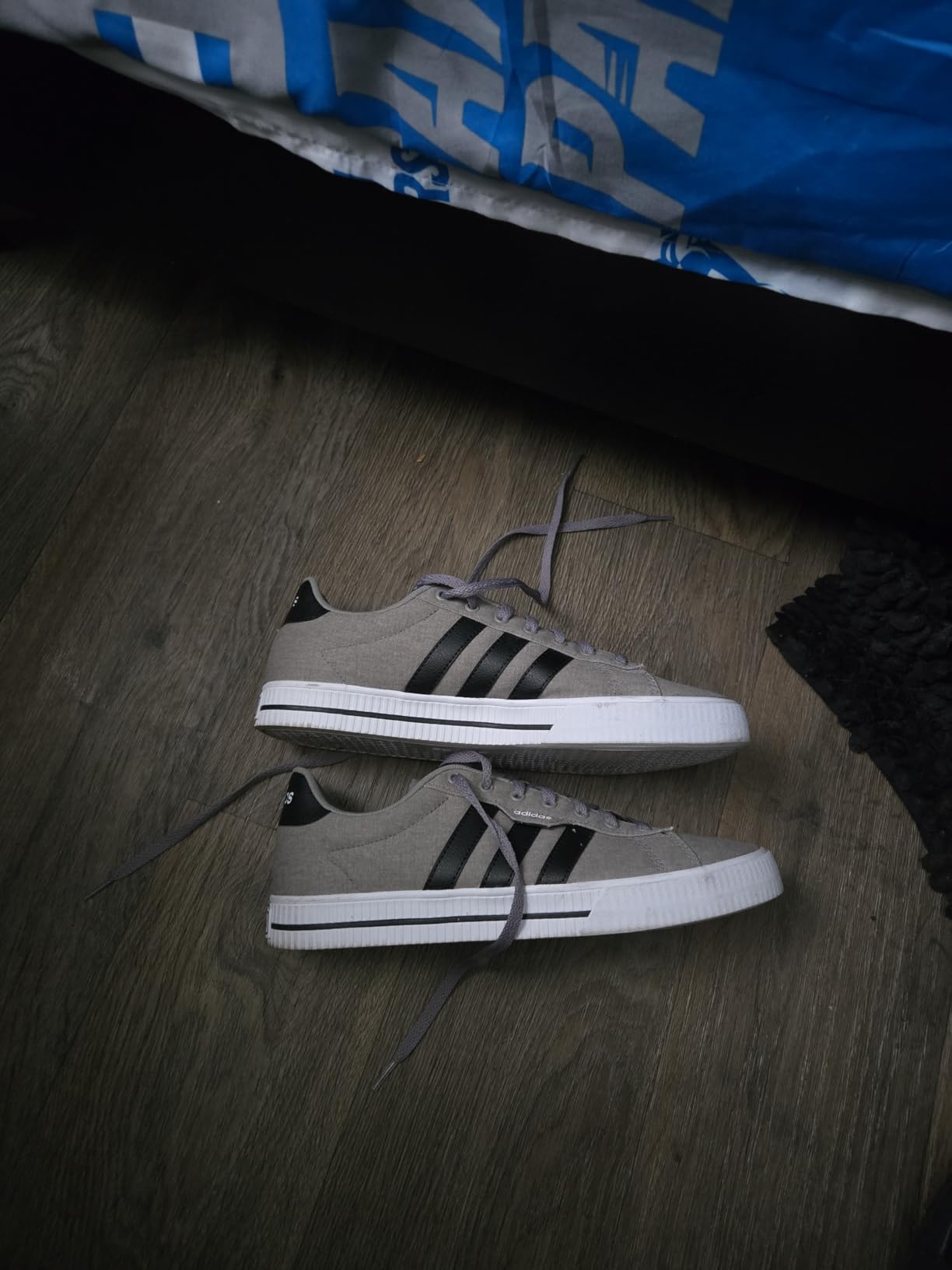 Close-up of Adidas Daily 3.0 showing build quality details and three stripes branding