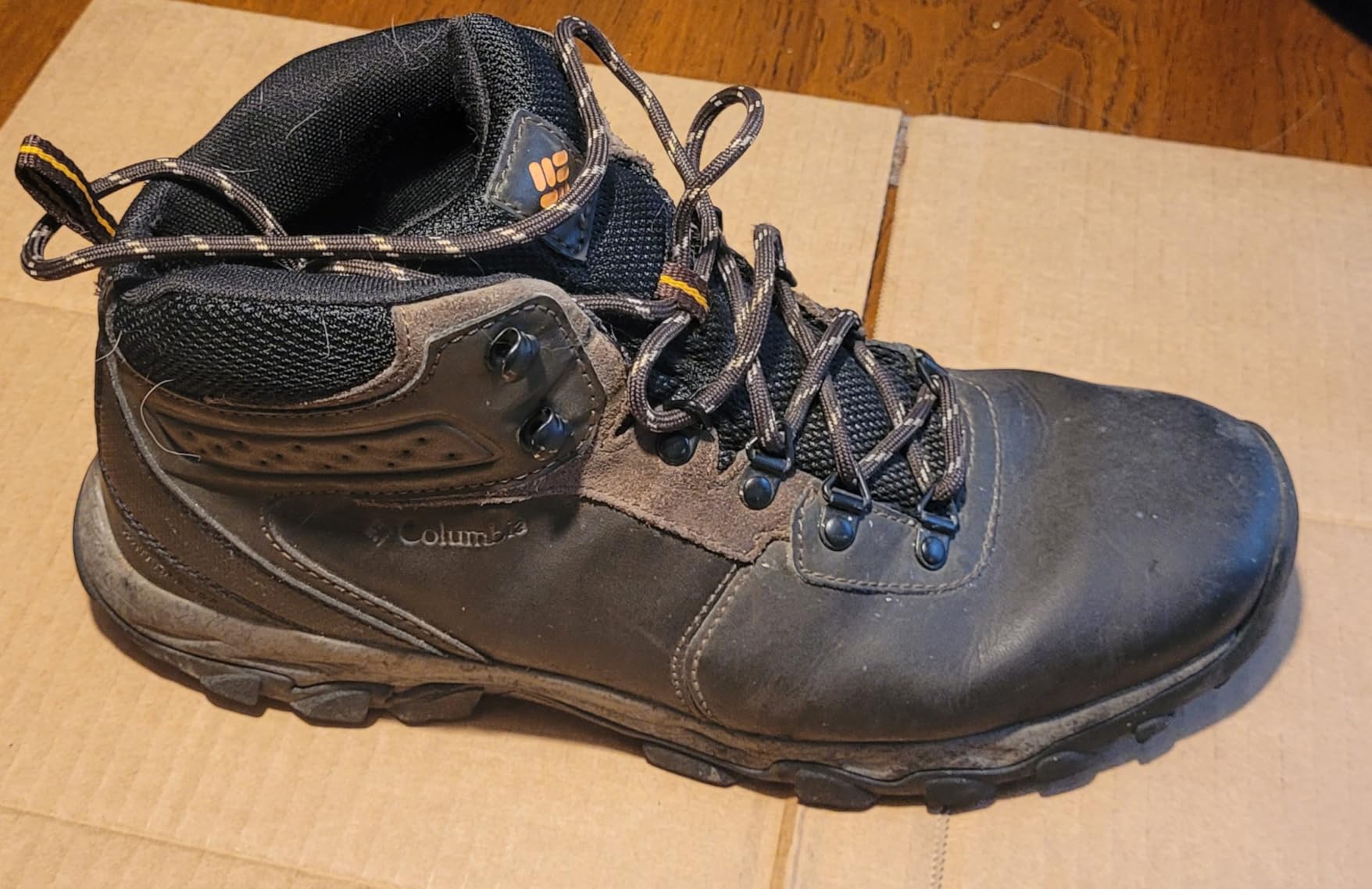 Side view of Columbia Newton Ridge hiking boot showing leather construction and mesh panels