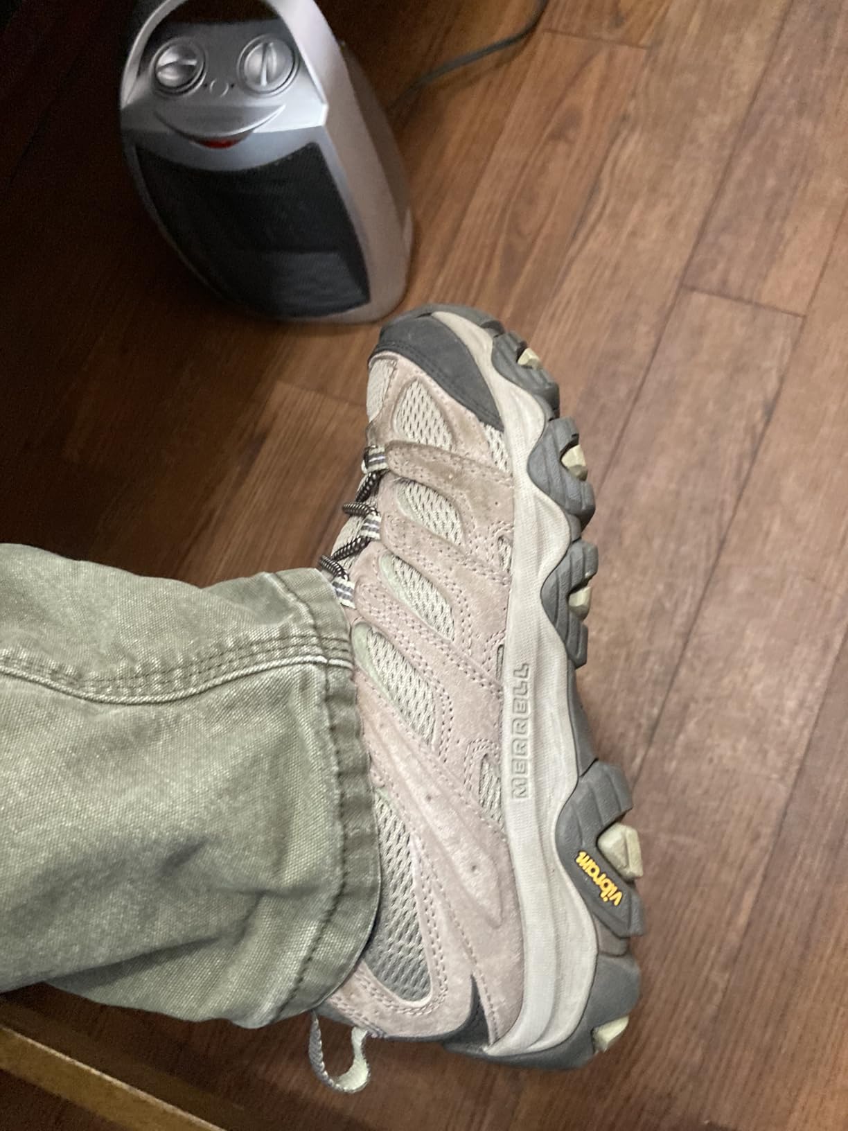 Close-up of Merrell Moab 3 upper construction showing leather and textile materials with lacing system