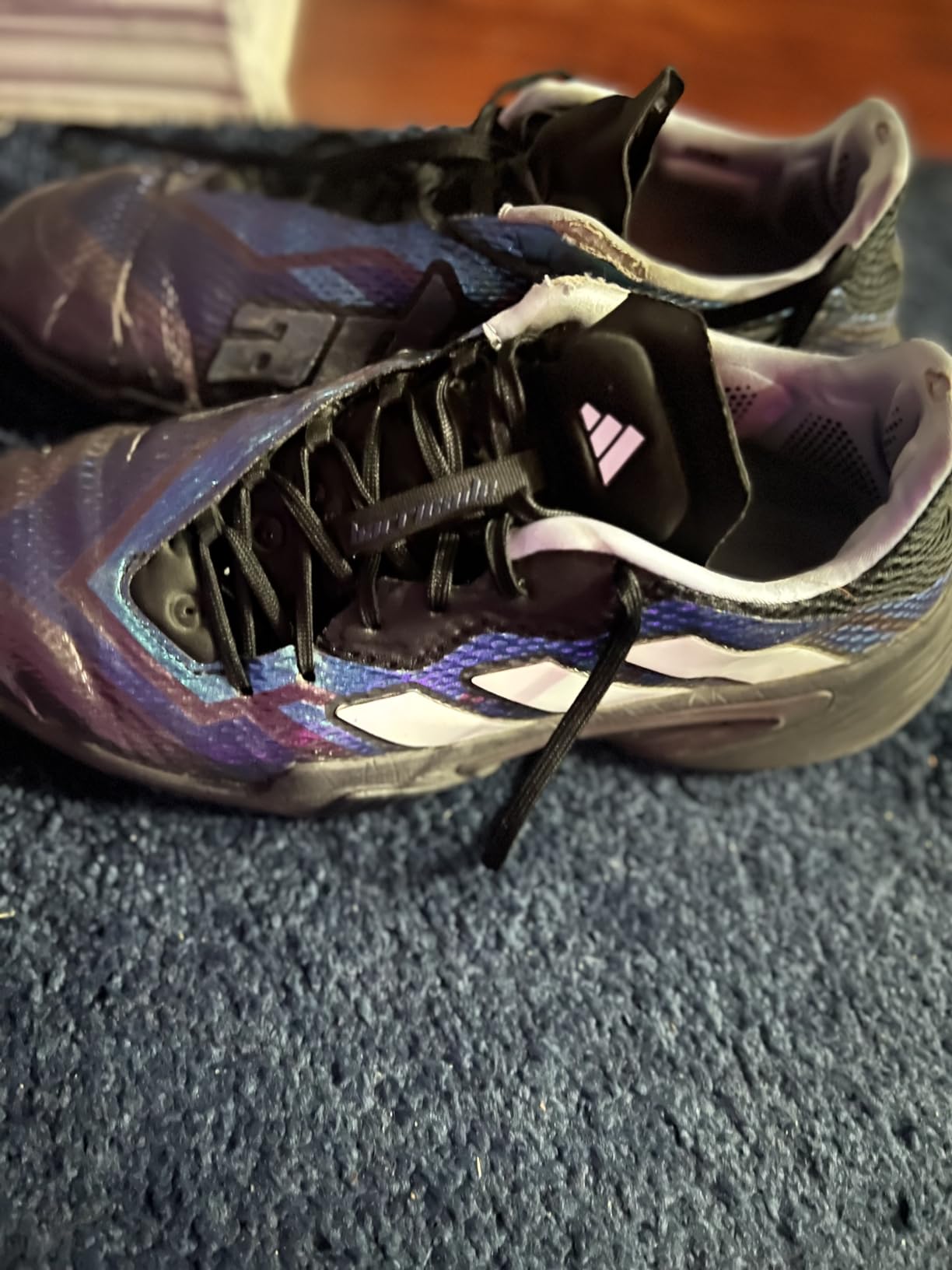 Worn outsole of Adidas Barricade showing durability issues after 4 months of outdoor court play