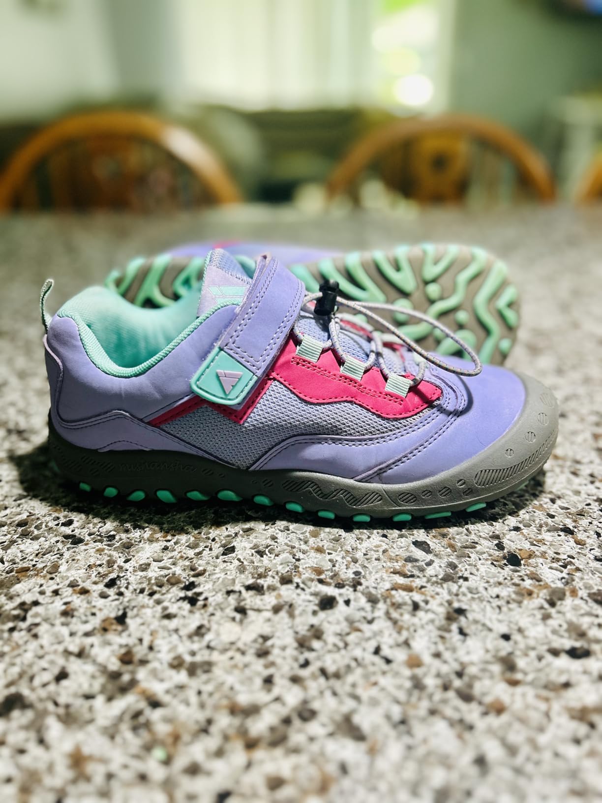 Side view of purple Mishansha hiking shoes showing ankle height and overall profile