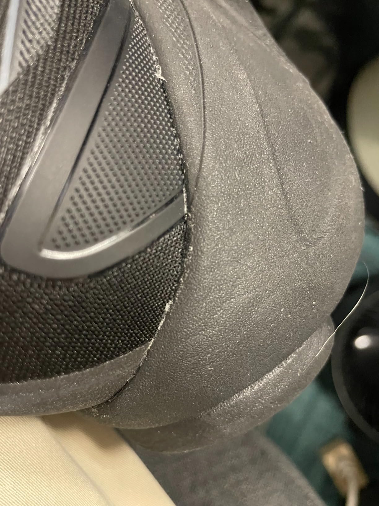 Detailed view of outsole rubber compound and tread pattern for traction analysis