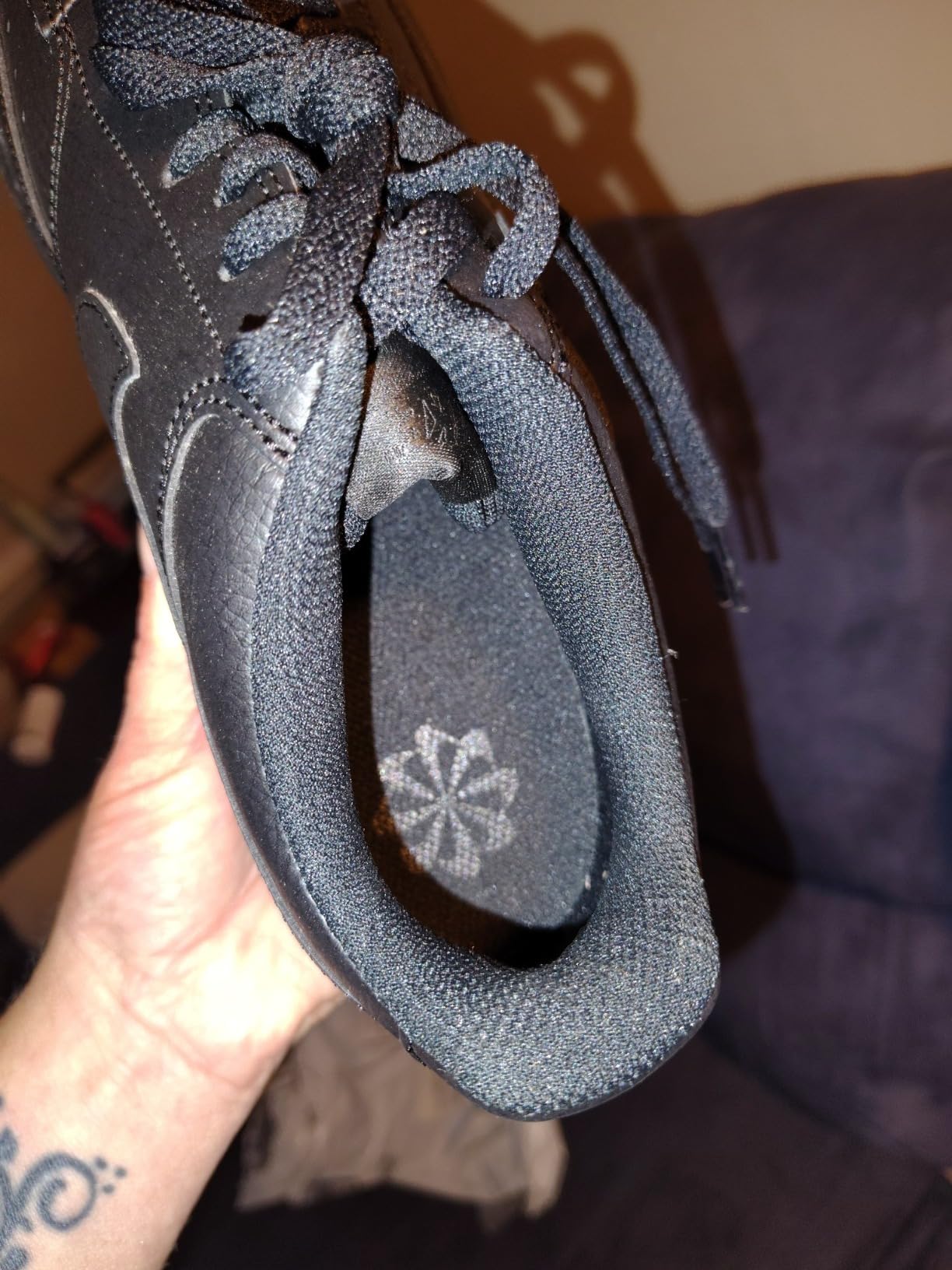 Nike Men's Sneaker on foot showing real-world wear and styling
