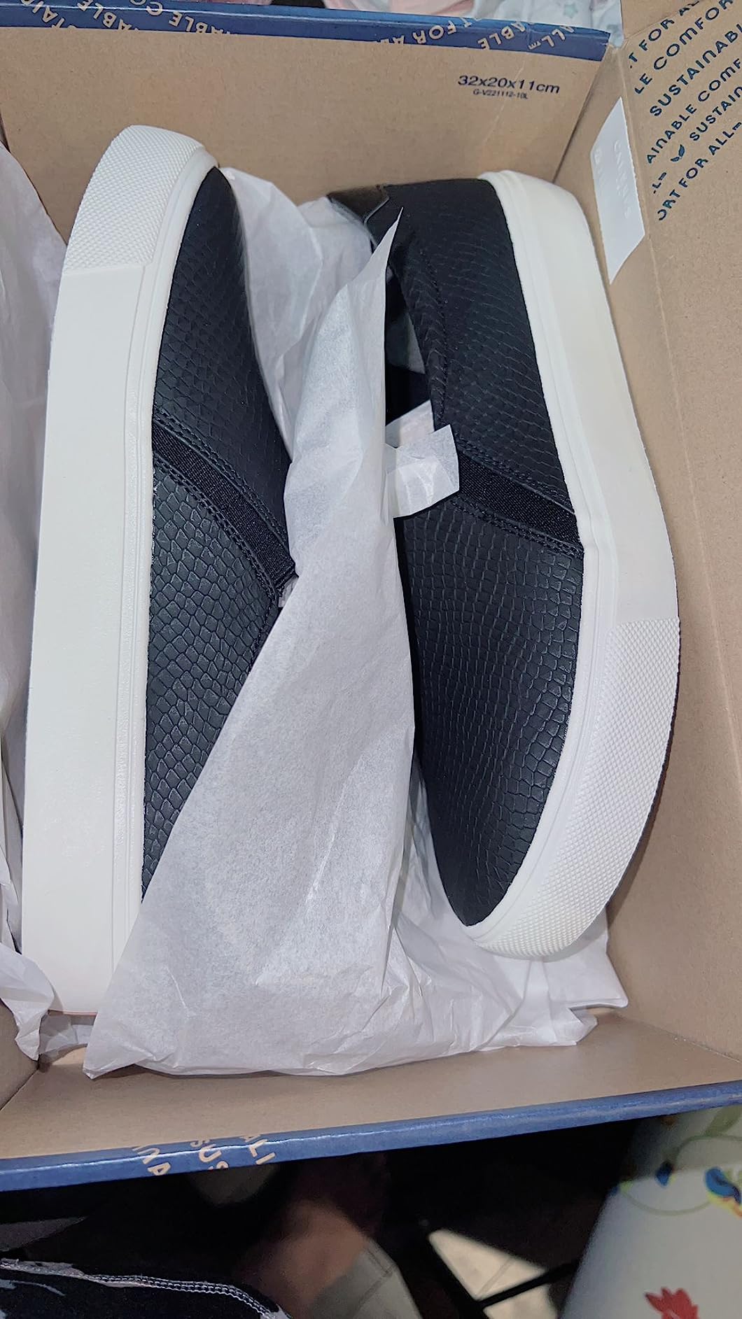 Dr. Scholl's Nova lifestyle shot showing versatile black slip-on design