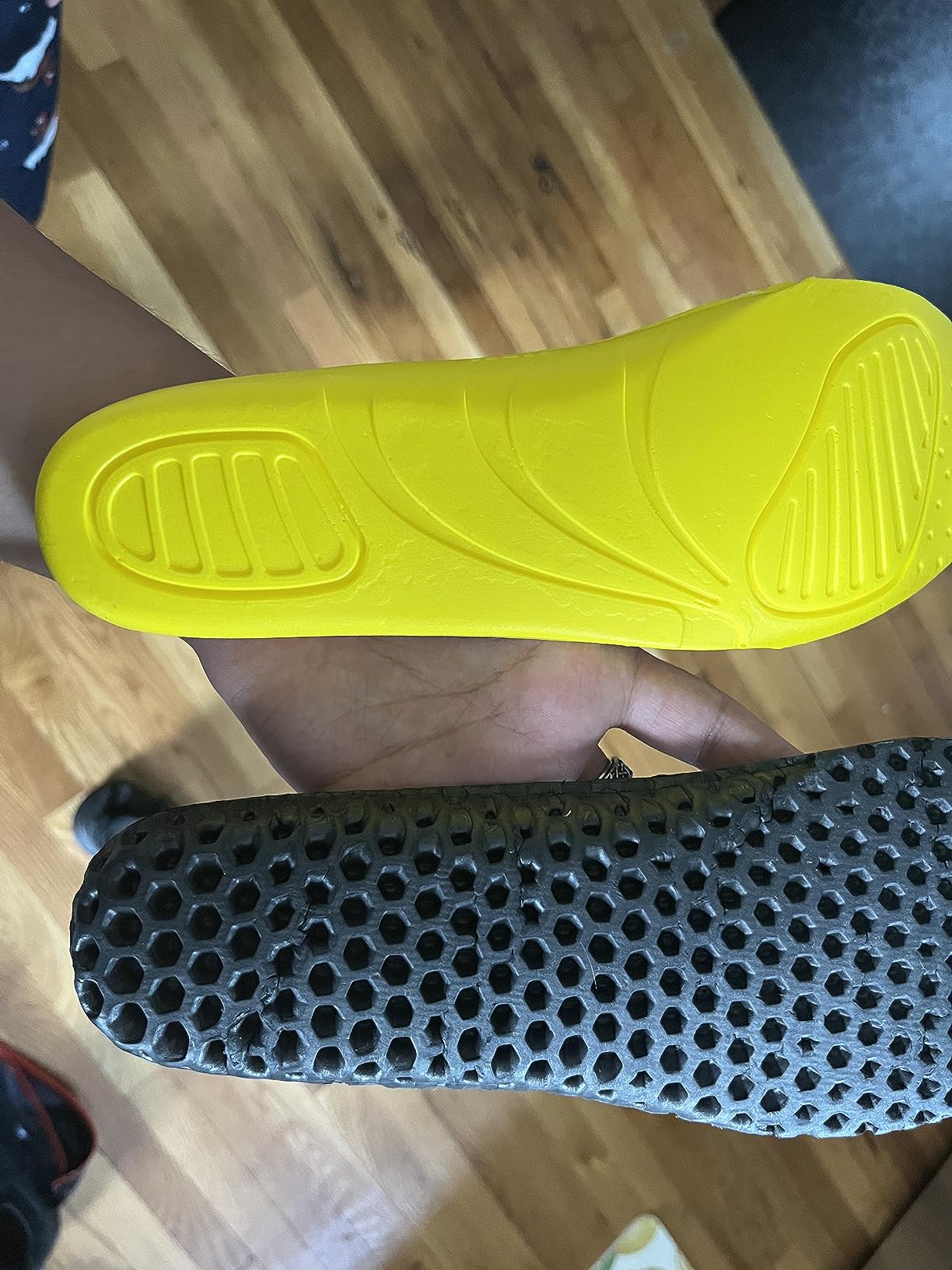 Thin memory foam insole compared to standard athletic shoe insole thickness