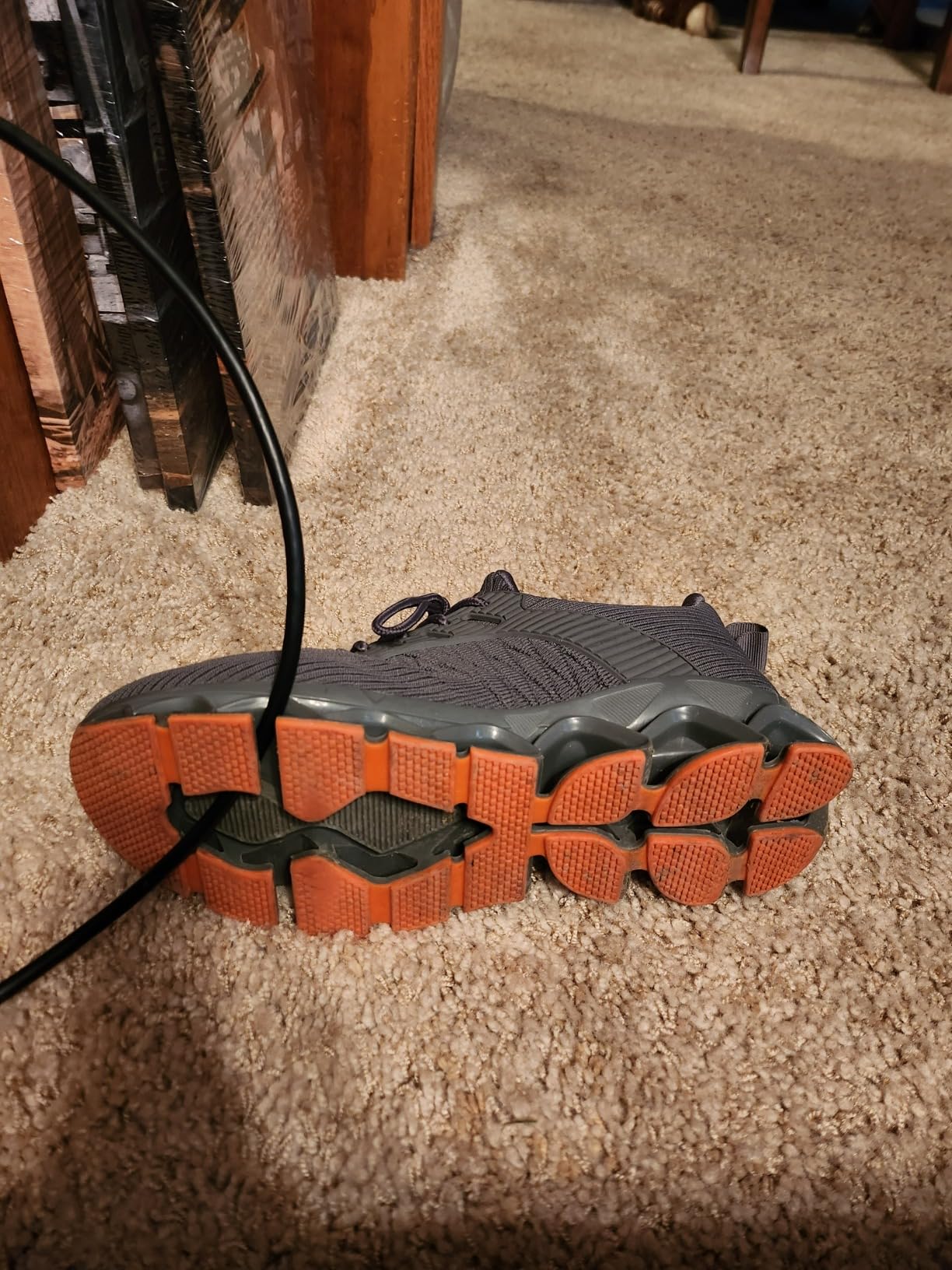 Bottom view of blade sneakers showing controversial lattice sole pattern with gaps and slits