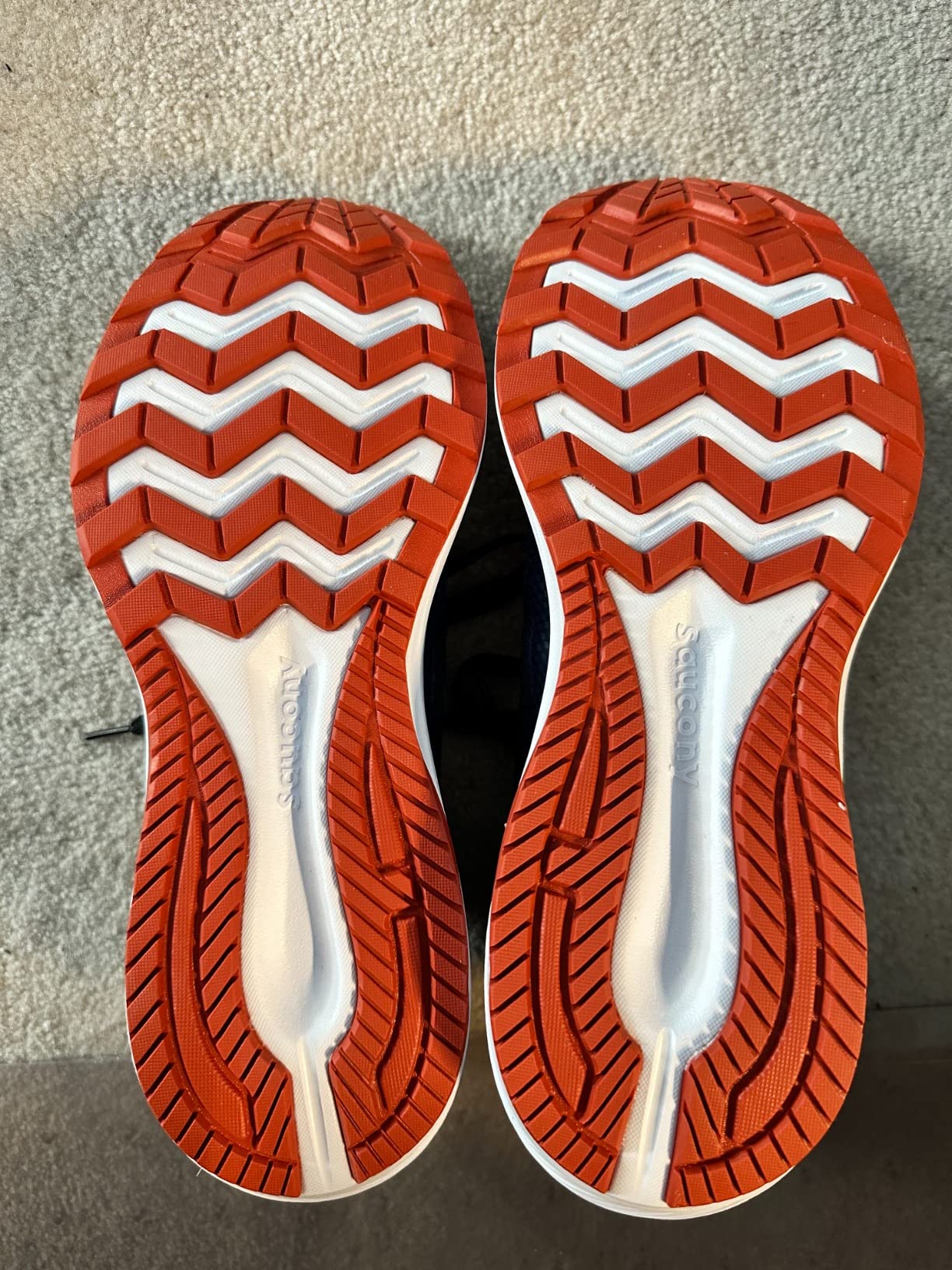 Side profile of Saucony Cohesion 16 showing VERSARUN midsole technology and heel counter design