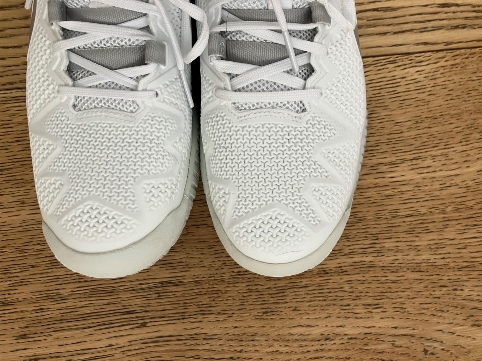 Final assessment photo of ASICS Gel-Resolution 8 tennis shoes showing overall design and court-ready appearance
