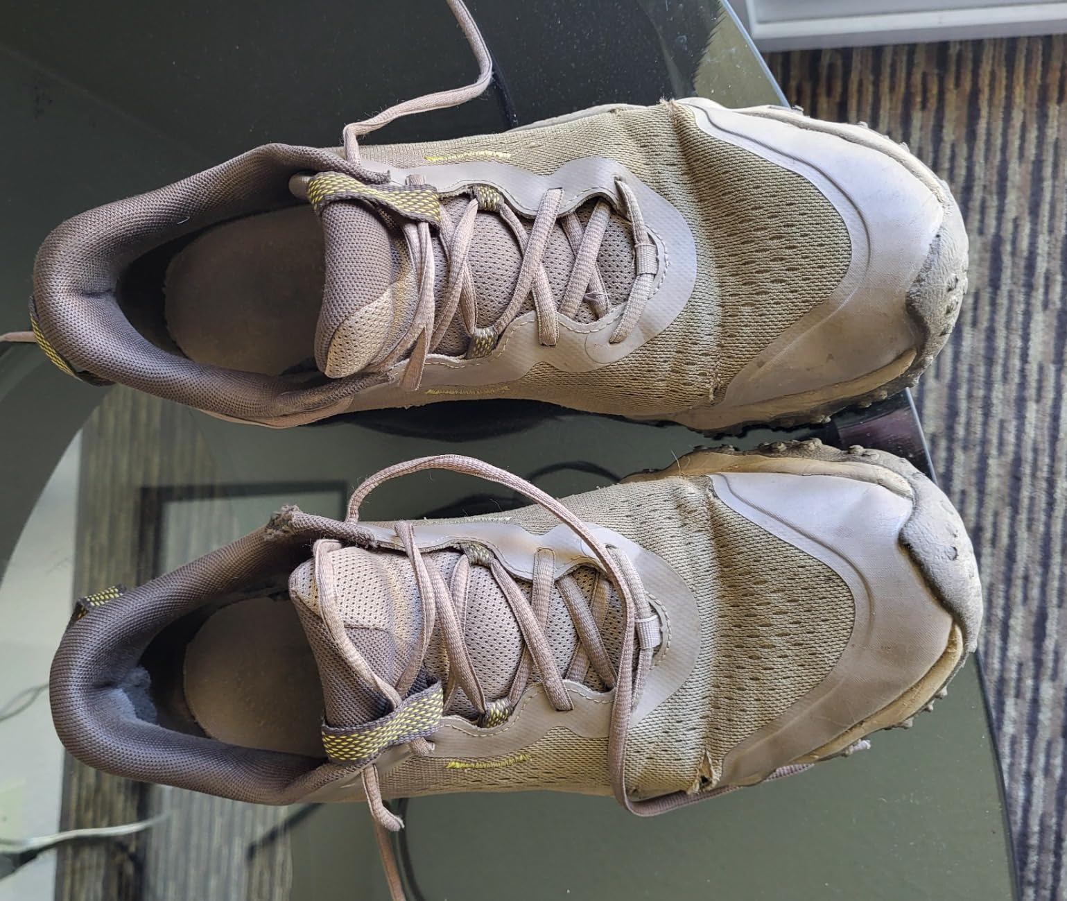 Under Armour Charged Maven trail shoes tested in multiple terrain conditions showing versatility and durability