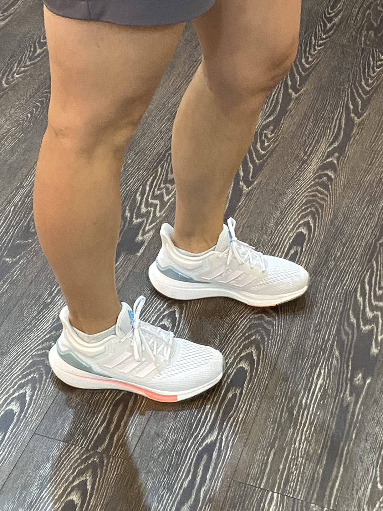 adidas Eq21 performance testing showing shoes during outdoor walking activity