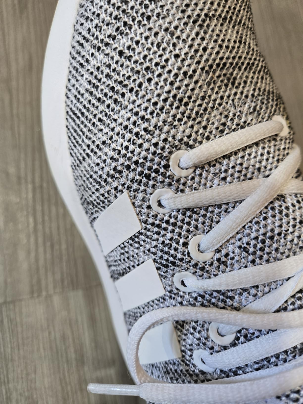 Adidas Cloudfoam Pure close-up showing mesh upper construction and decorative lacing system