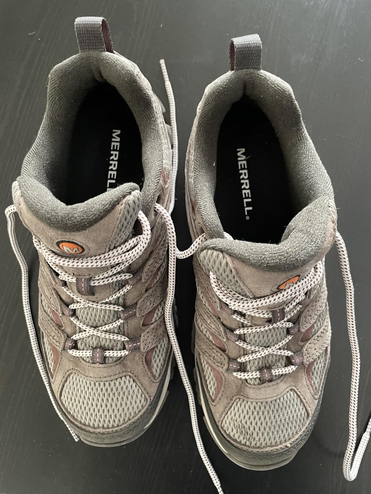Merrell Moab 3 hiking shoes on outdoor trail showing real-world performance