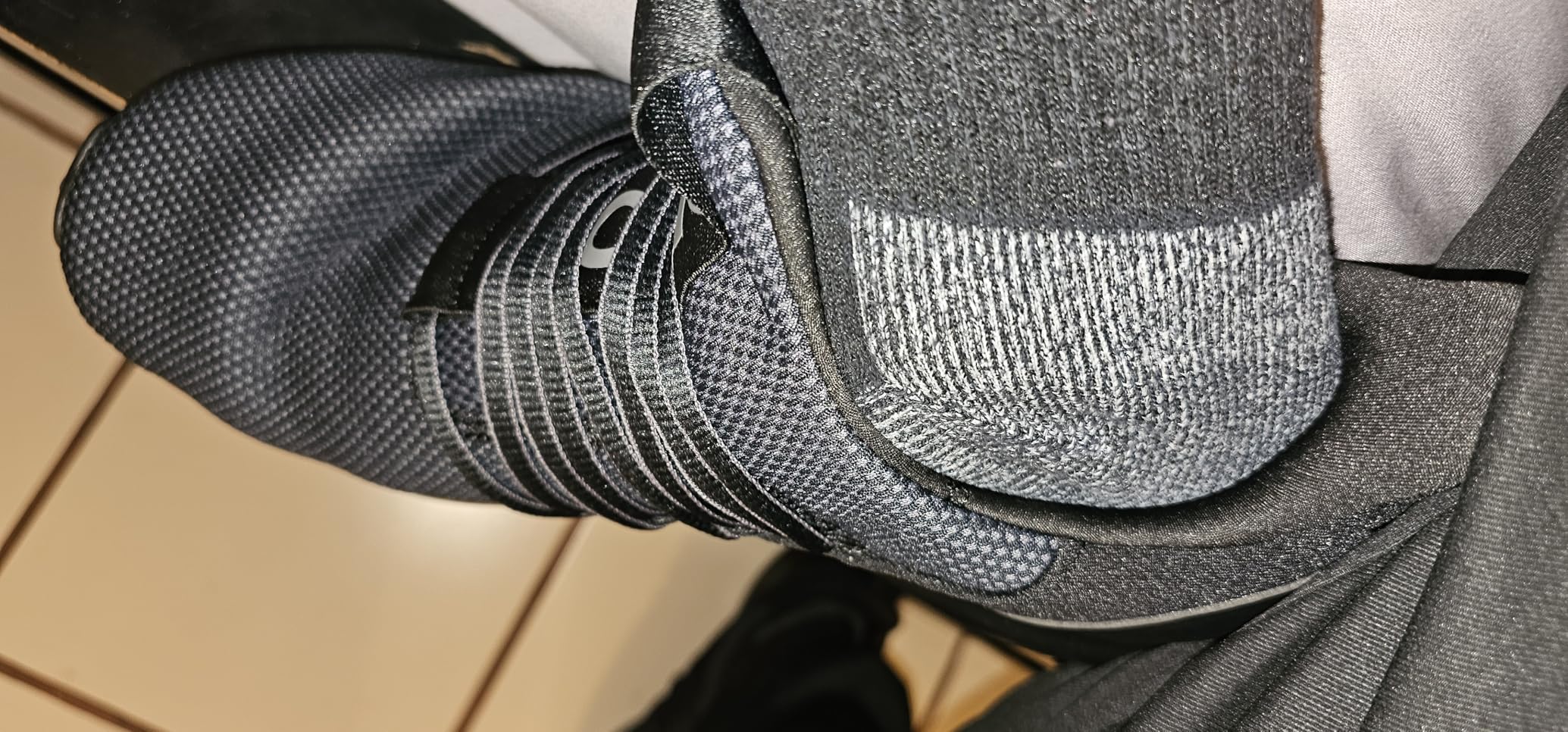 Top view of Adidas Lite Racer Adapt 7.0 showing stretched upper material during wear