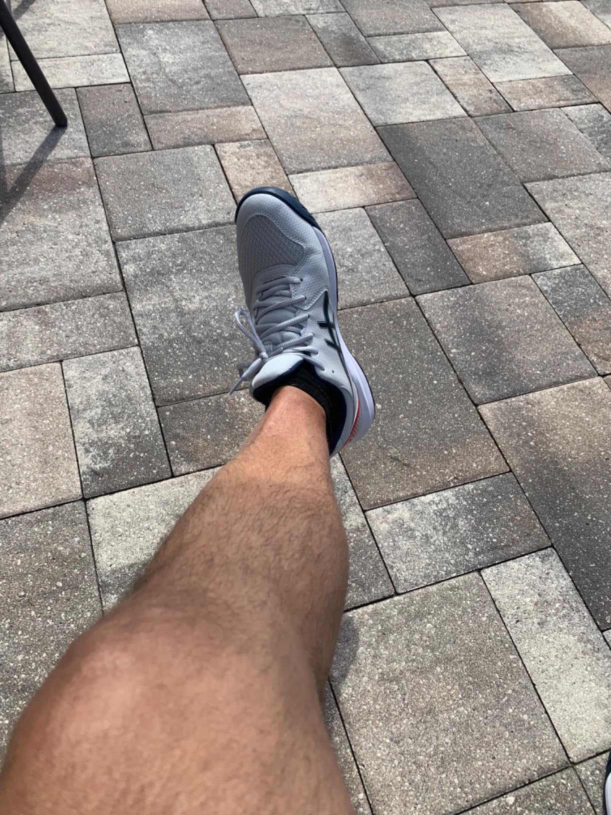 ASICS Gel-Dedicate 8 on tennis court showing performance during baseline play