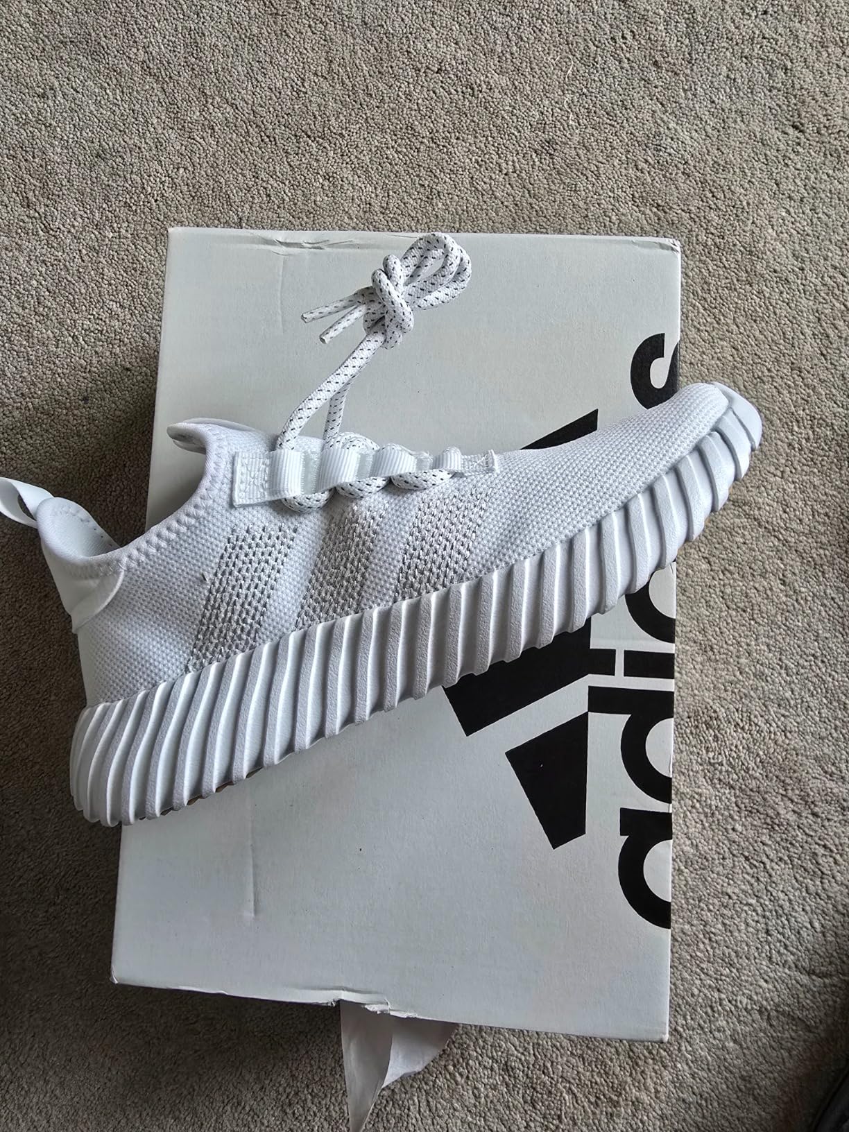 Adidas Kaptir Flow testing in various conditions showing rubber outsole traction pattern