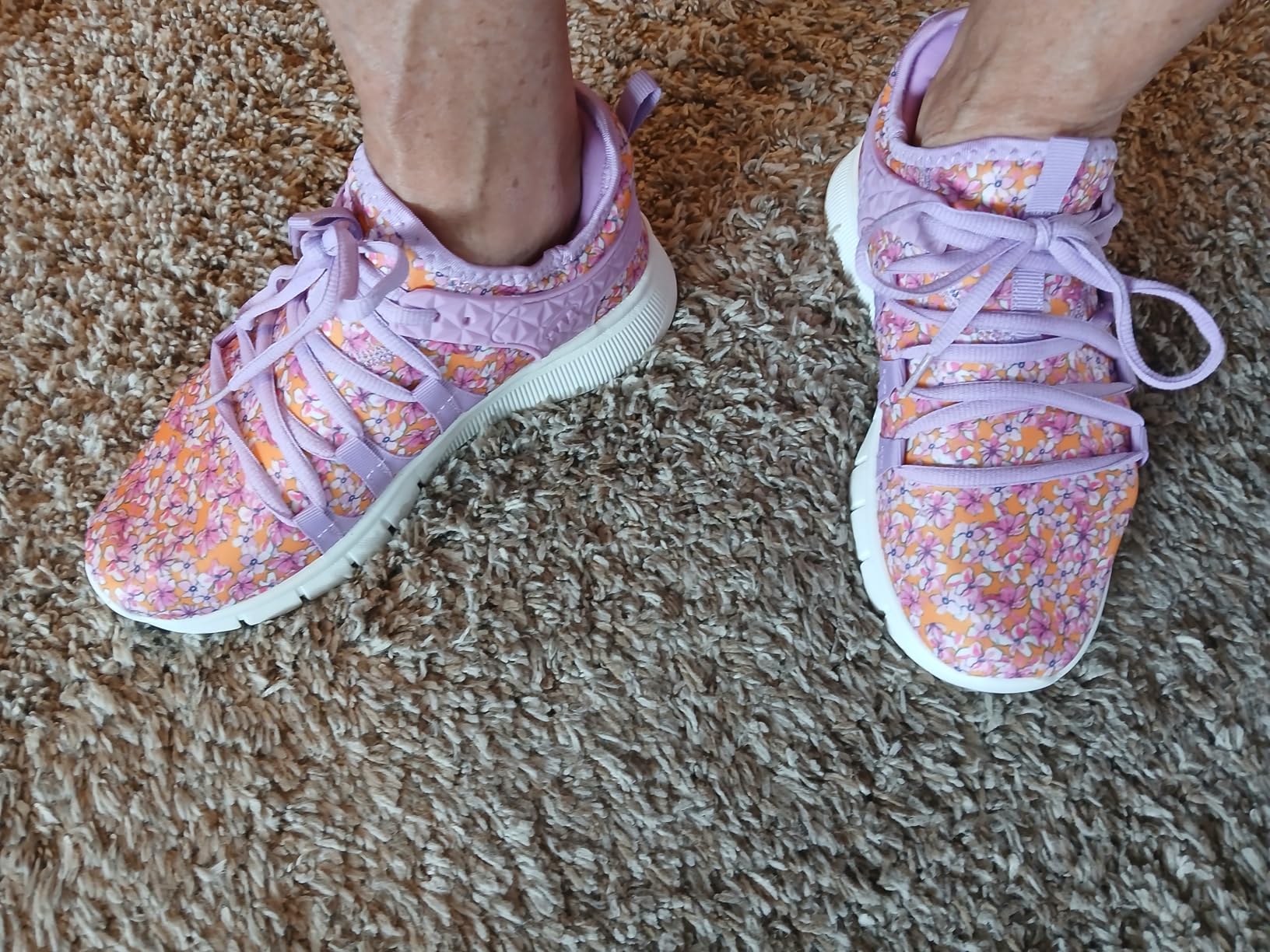 INZCOU running shoes lifestyle shot showing colorful design and slip-on convenience