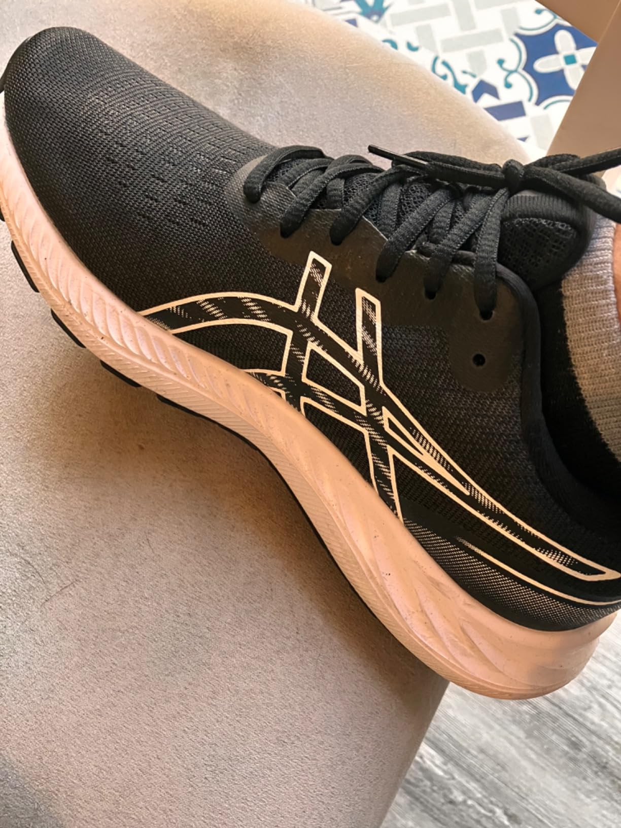 ASICS Women's Gel-Excite 9 running shoes in Barely Rose White colorway showing mesh upper design