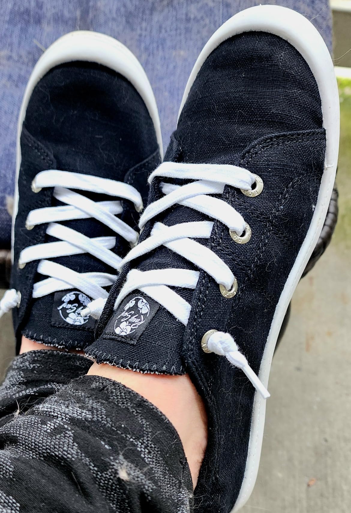 Close-up of Roxy Rory sneaker showing textile upper construction and slip-on design details