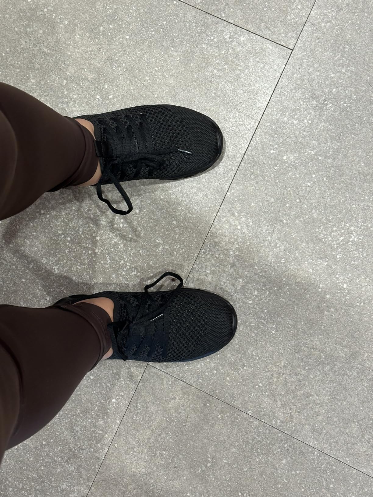 Close-up detail of Tvtaop sneaker showing breathable mesh construction and side support