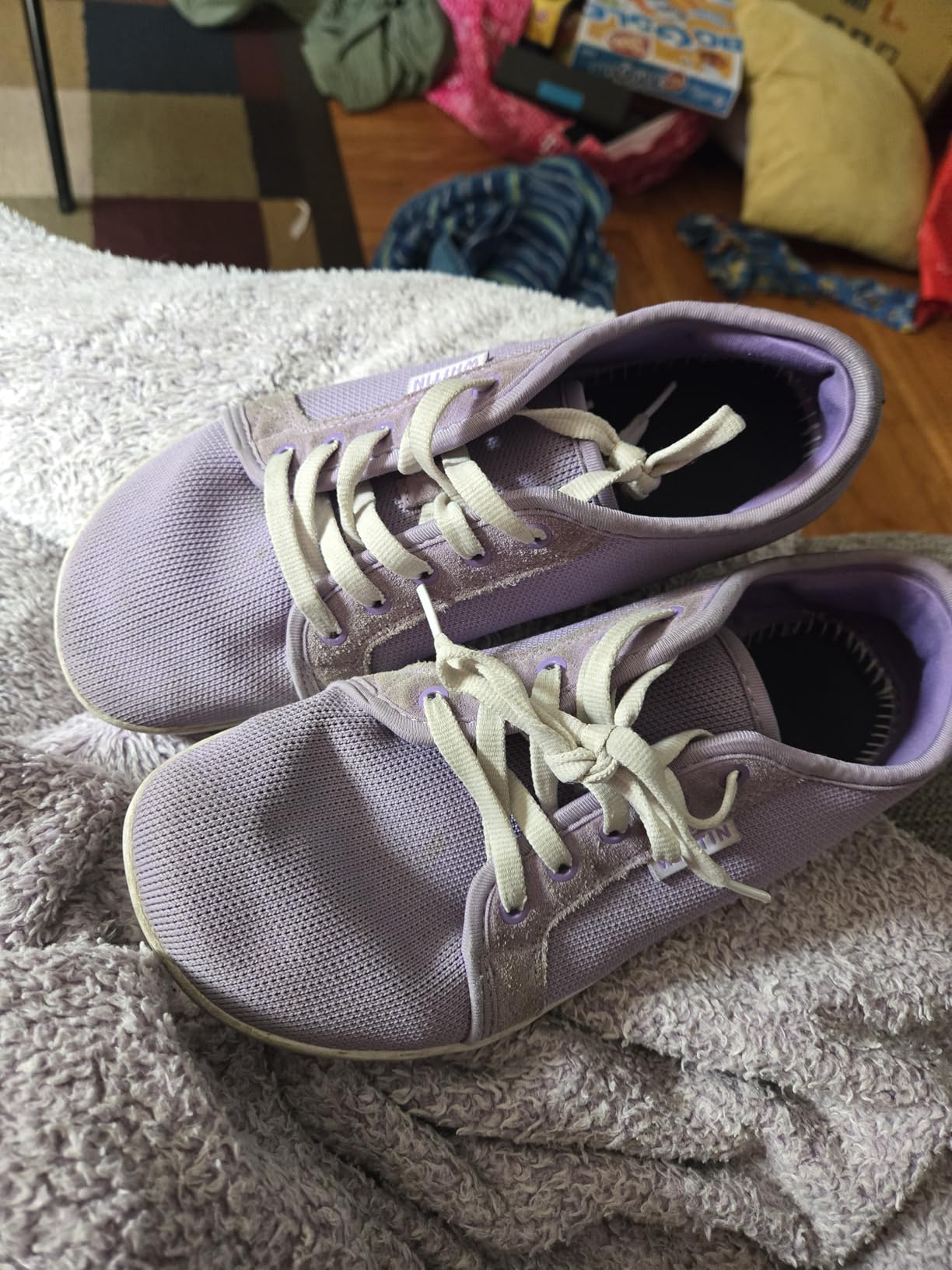 WHITIN barefoot shoes in purple colorway being worn for daily activities showing real-world usage